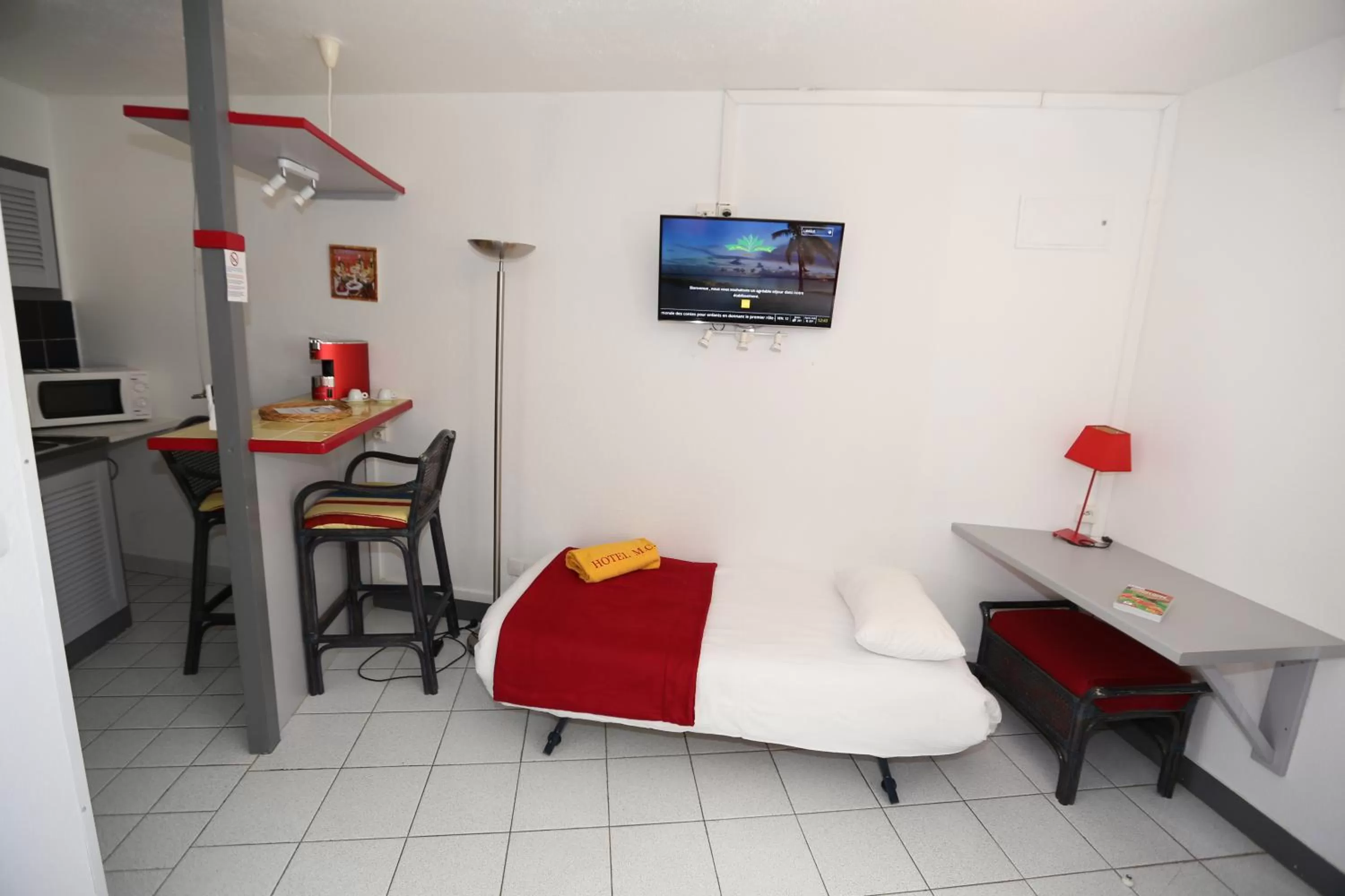 Kitchen or kitchenette in Hotel La Maison Creole