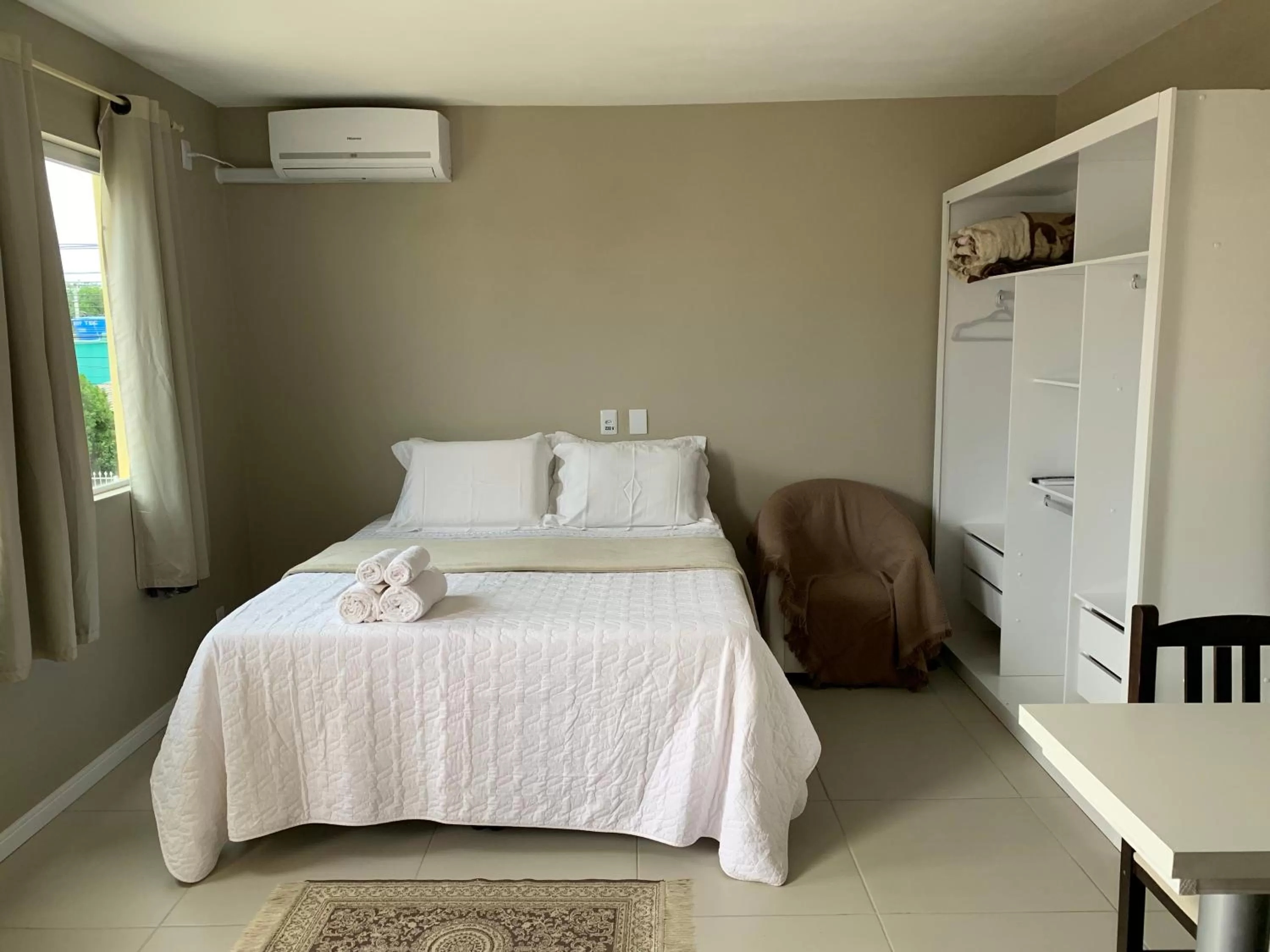 Bed in Pousada Mercosul