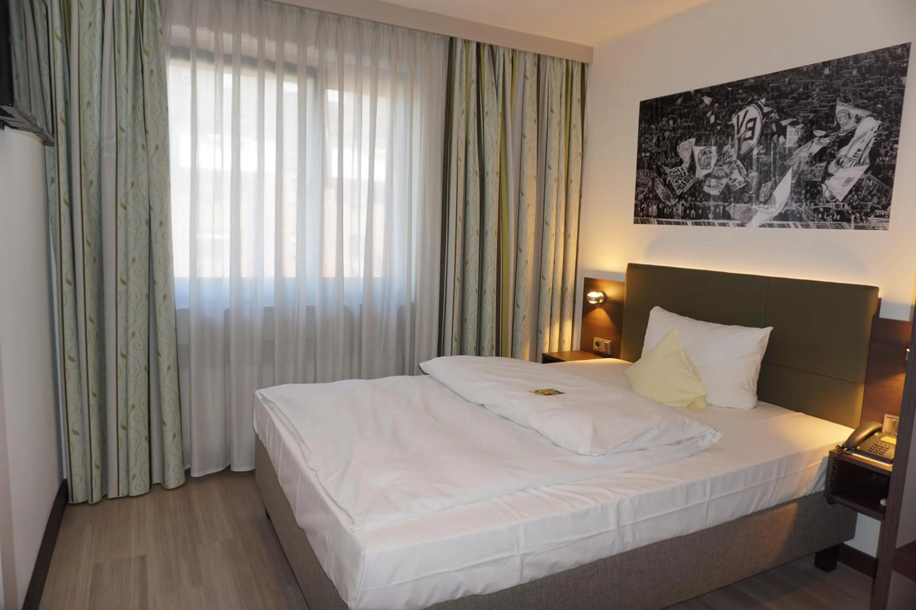Photo of the whole room, Bed in Ringhotel Drees