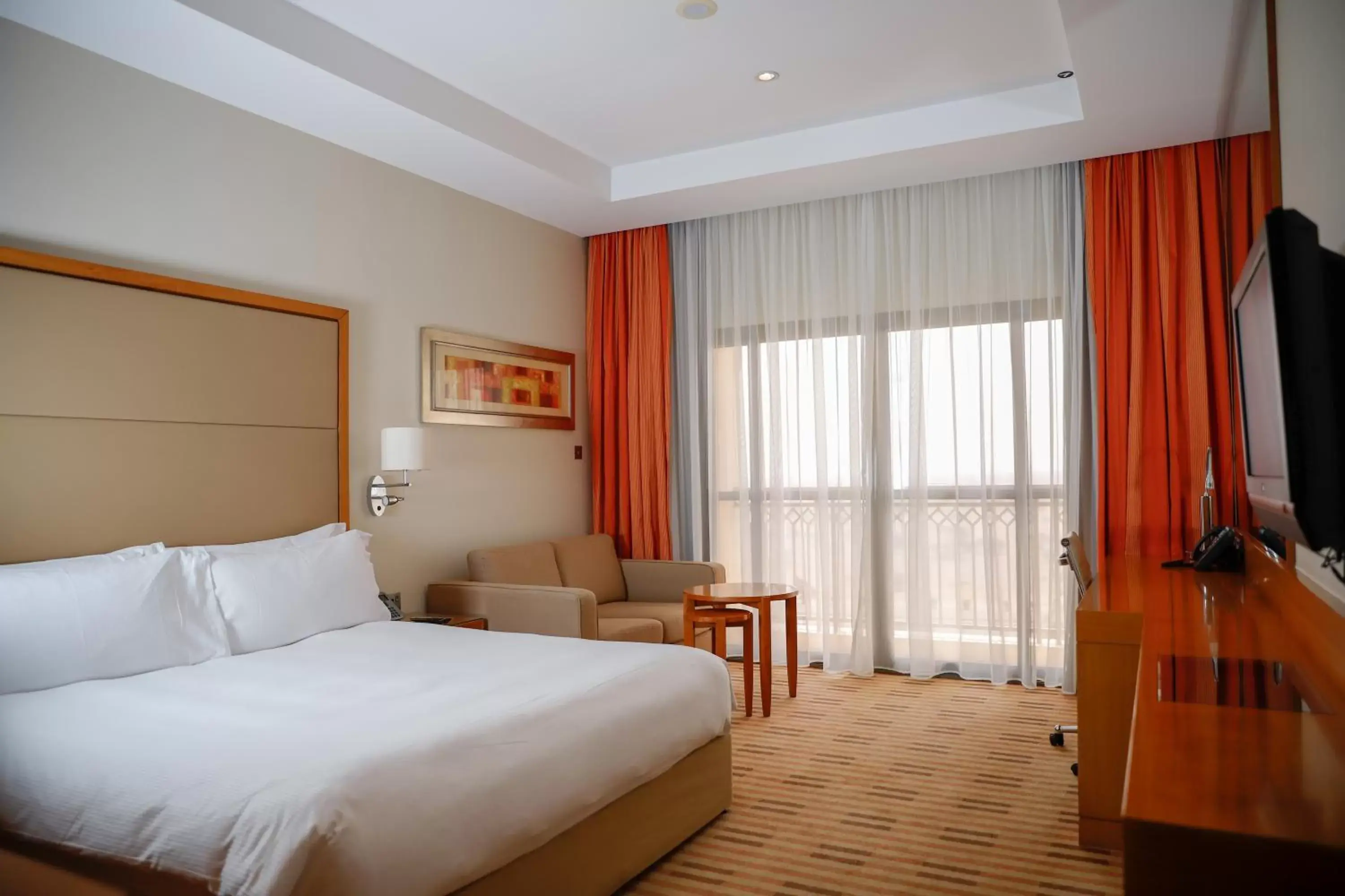 Bed in Crowne Plaza Sohar, an IHG Hotel