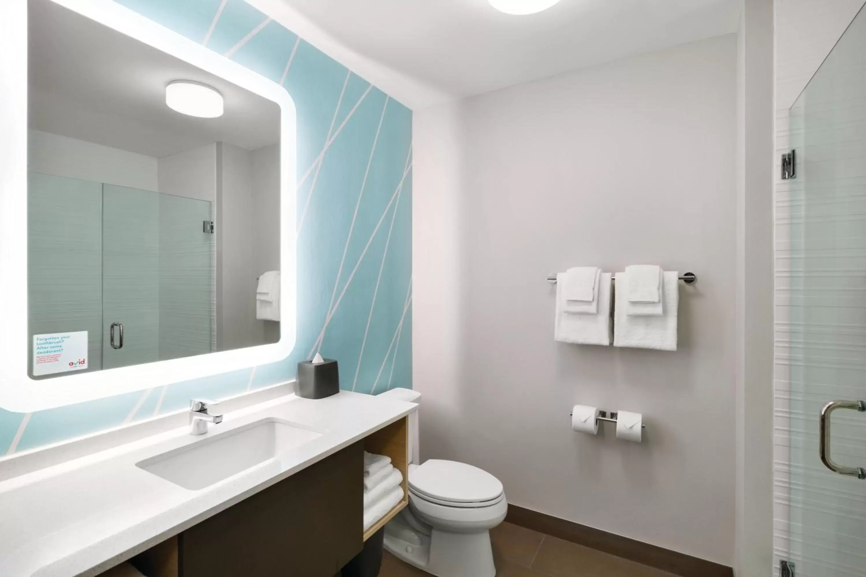 Bathroom in avid hotels - Orlando International Airport, an IHG Hotel