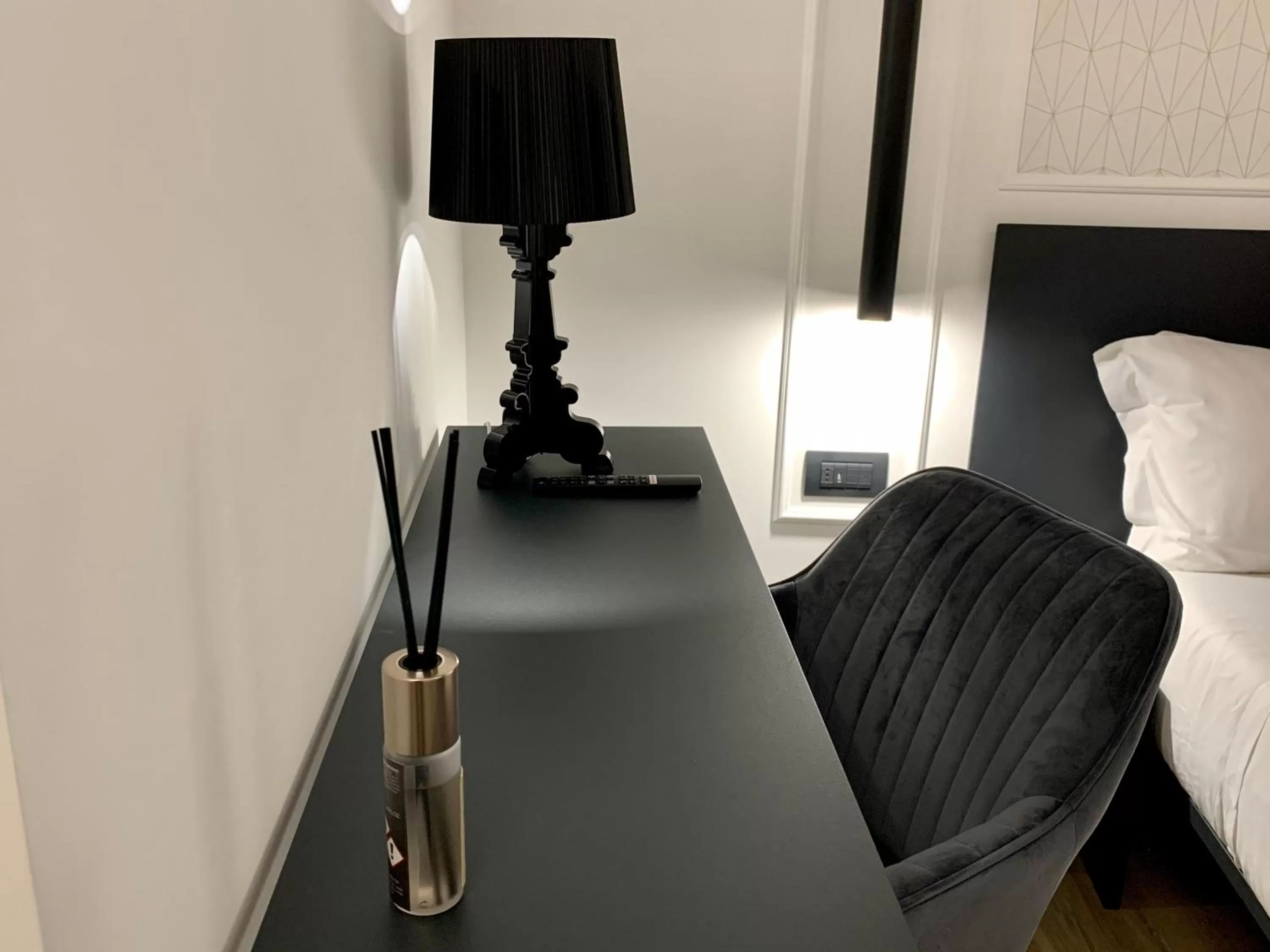 Bedroom in Toledo Boutique Rooms