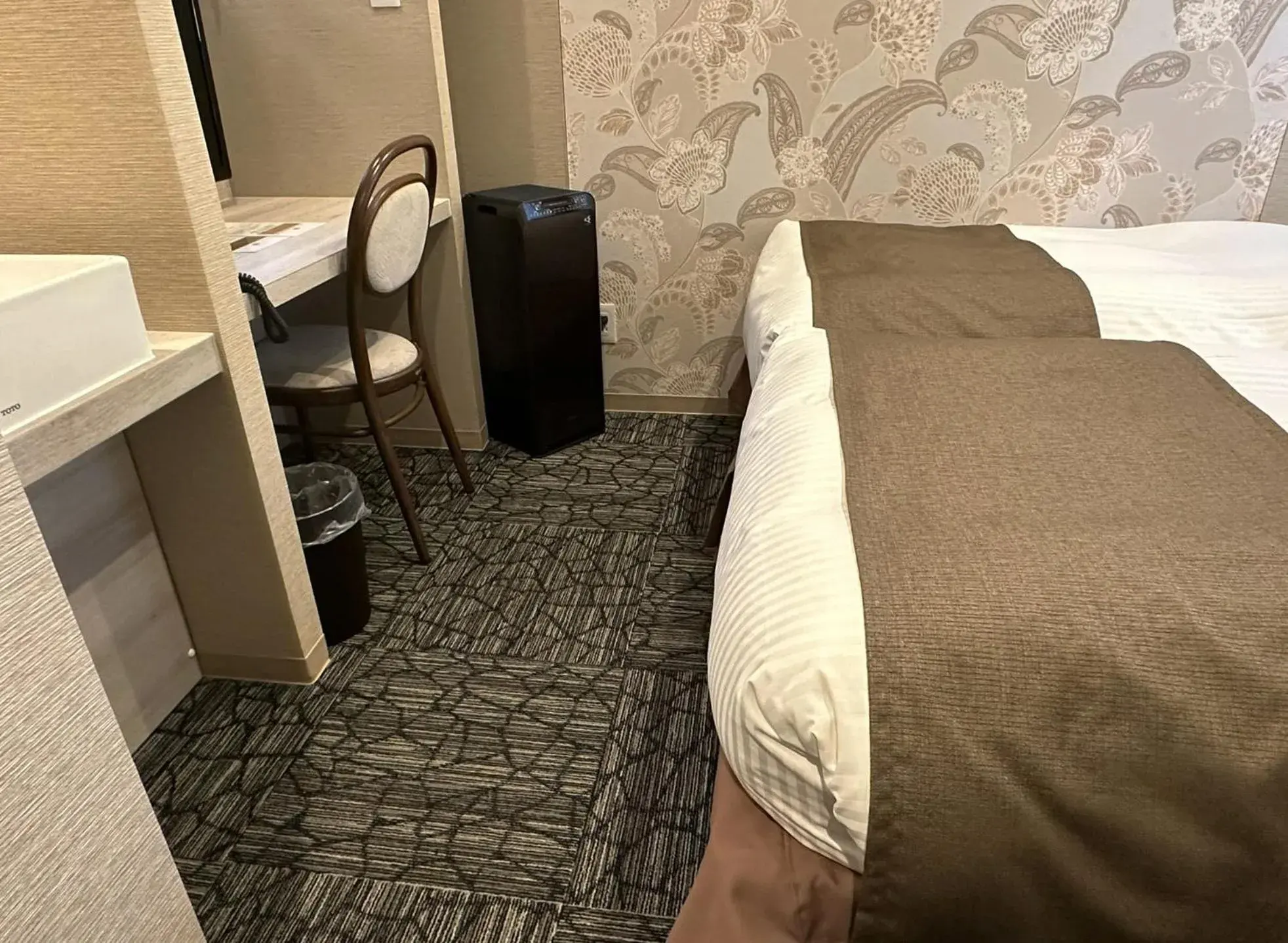 Bed in S.Training Center Hotel