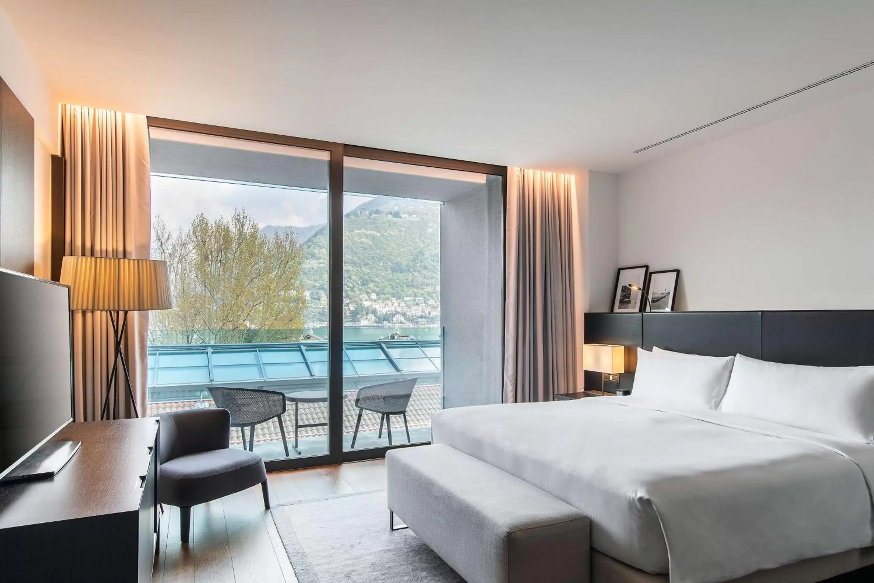 Bed, Pool View in Hilton Lake Como