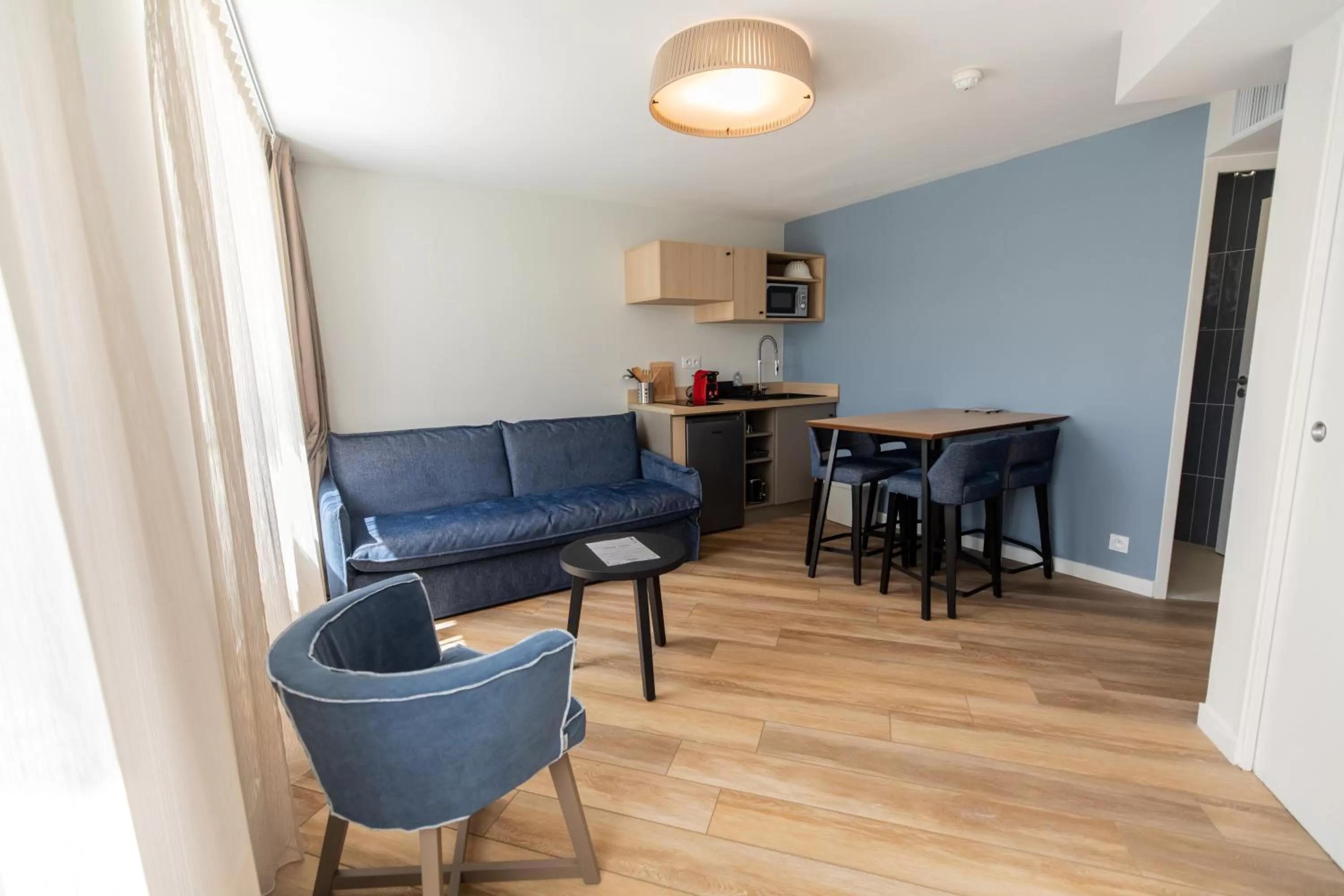 Kitchen or kitchenette in Hôtel de la Baie