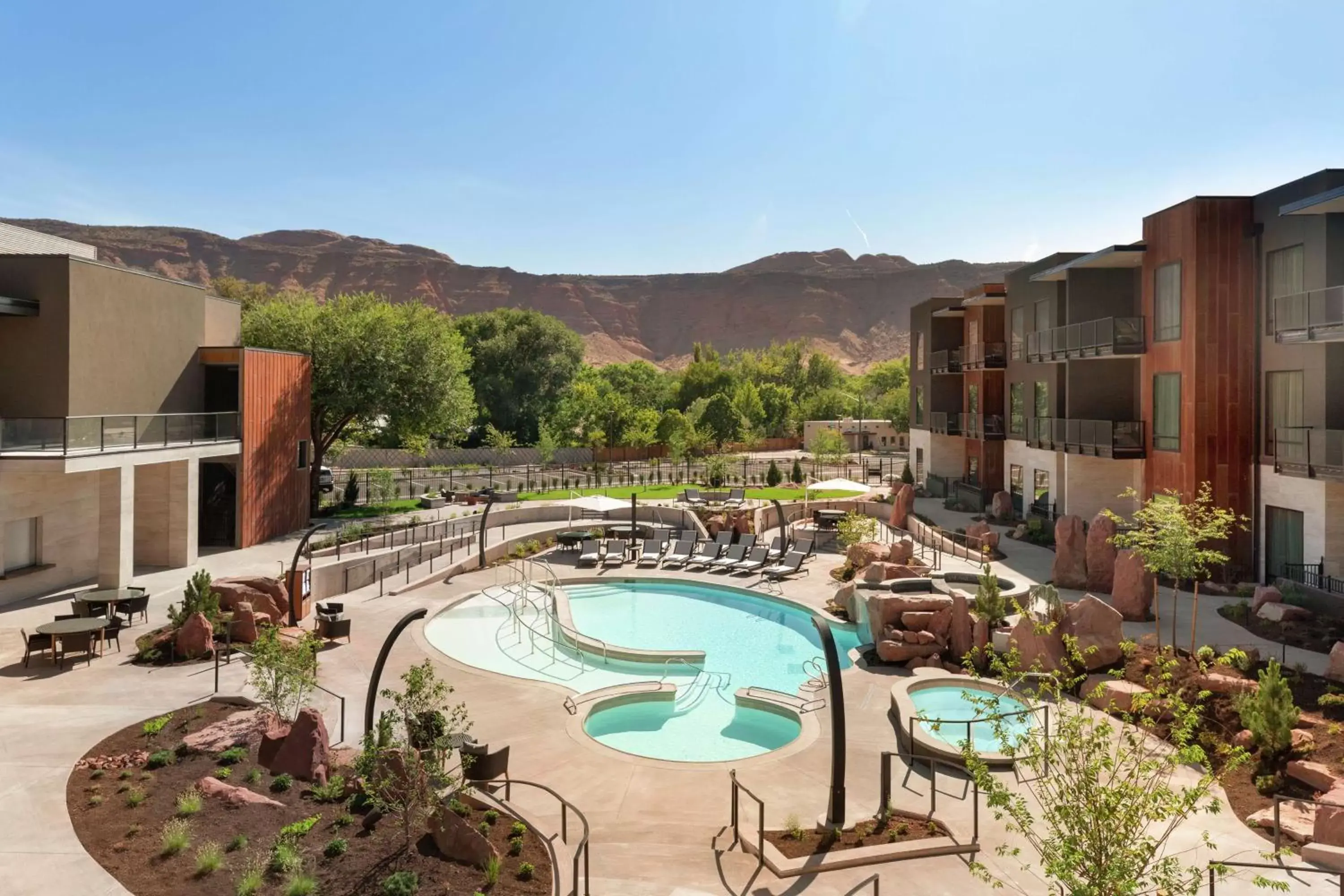 Pool view in Hoodoo Moab, Curio Collection by Hilton Pool view in Hoodoo Moab, Curio Collection by Hilton