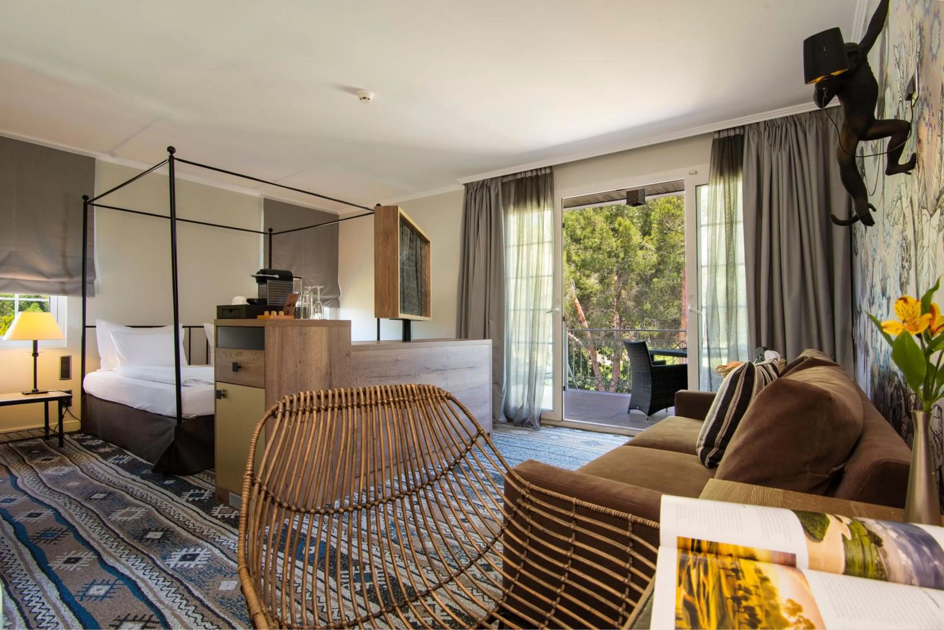 Living room, Bed in Lindner Hotel Mallorca Portals Nous, part of JdV by Hyatt