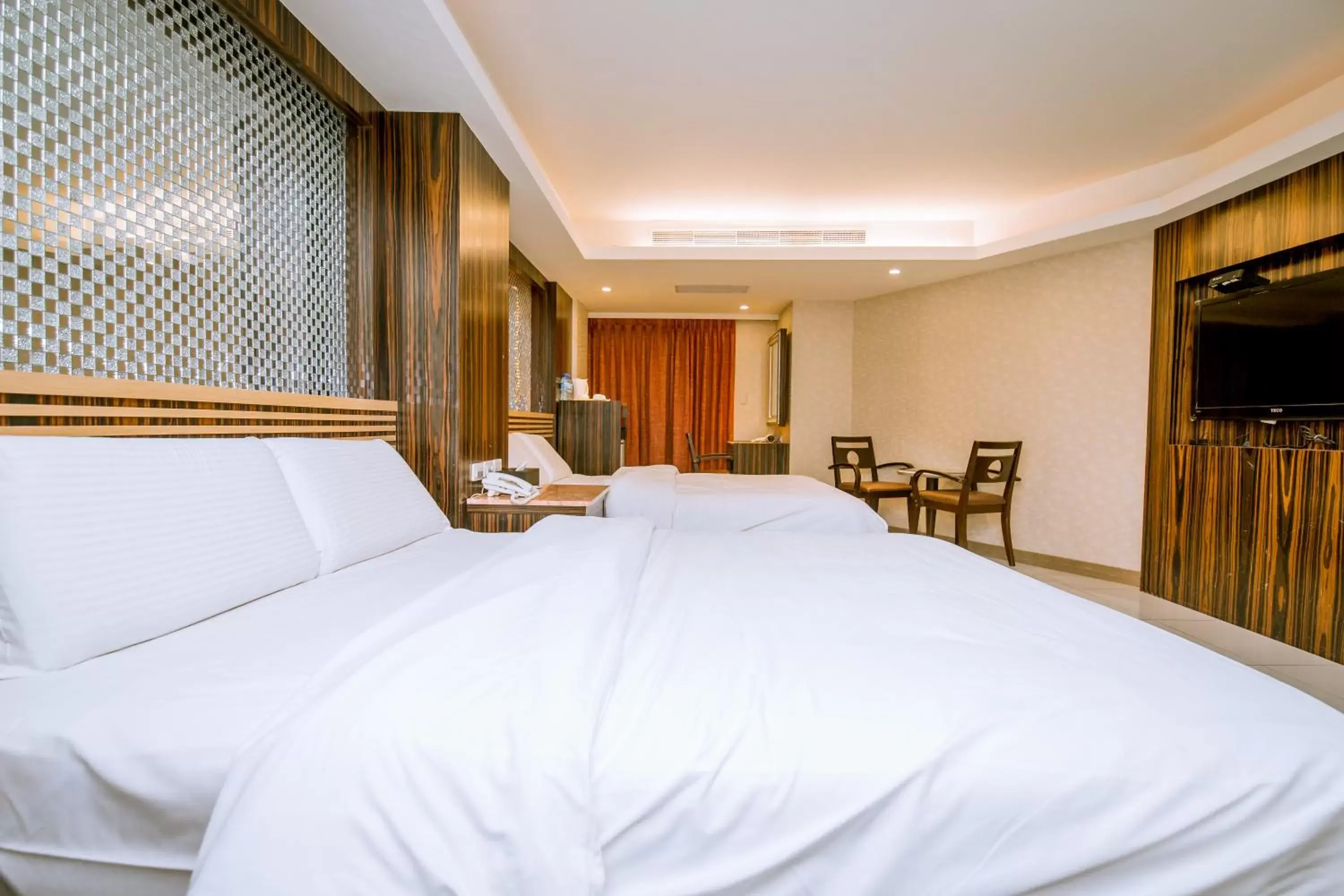 Communal lounge/ TV room, Bed in Guide Hotel Taipei Xinyi