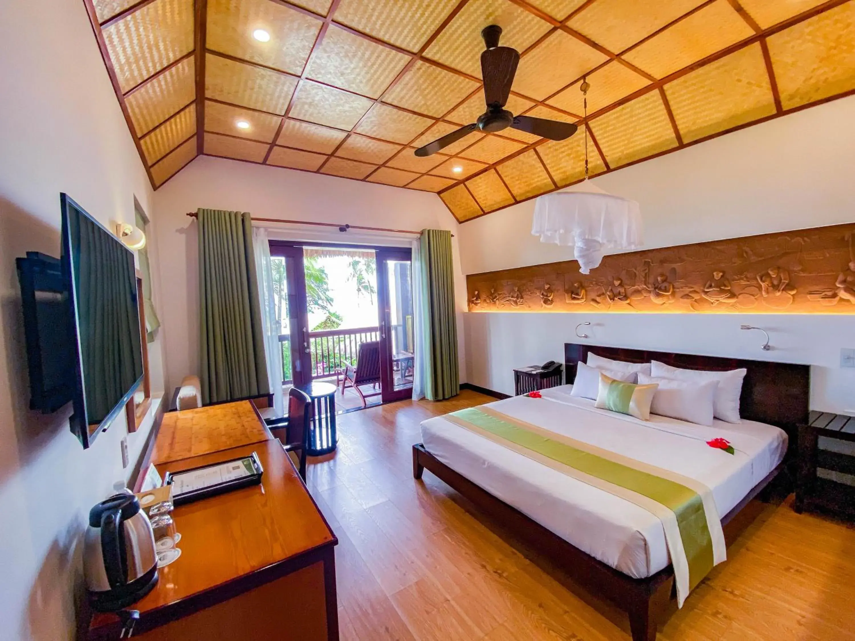 Bed in Bamboo Village Beach Resort & Spa