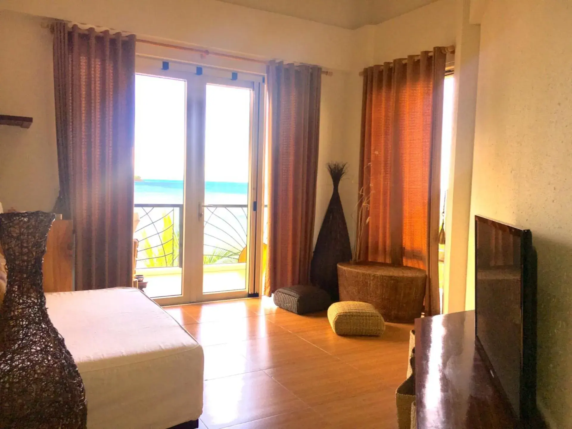 Bedroom in Sunset At Aninuan Beach Resort