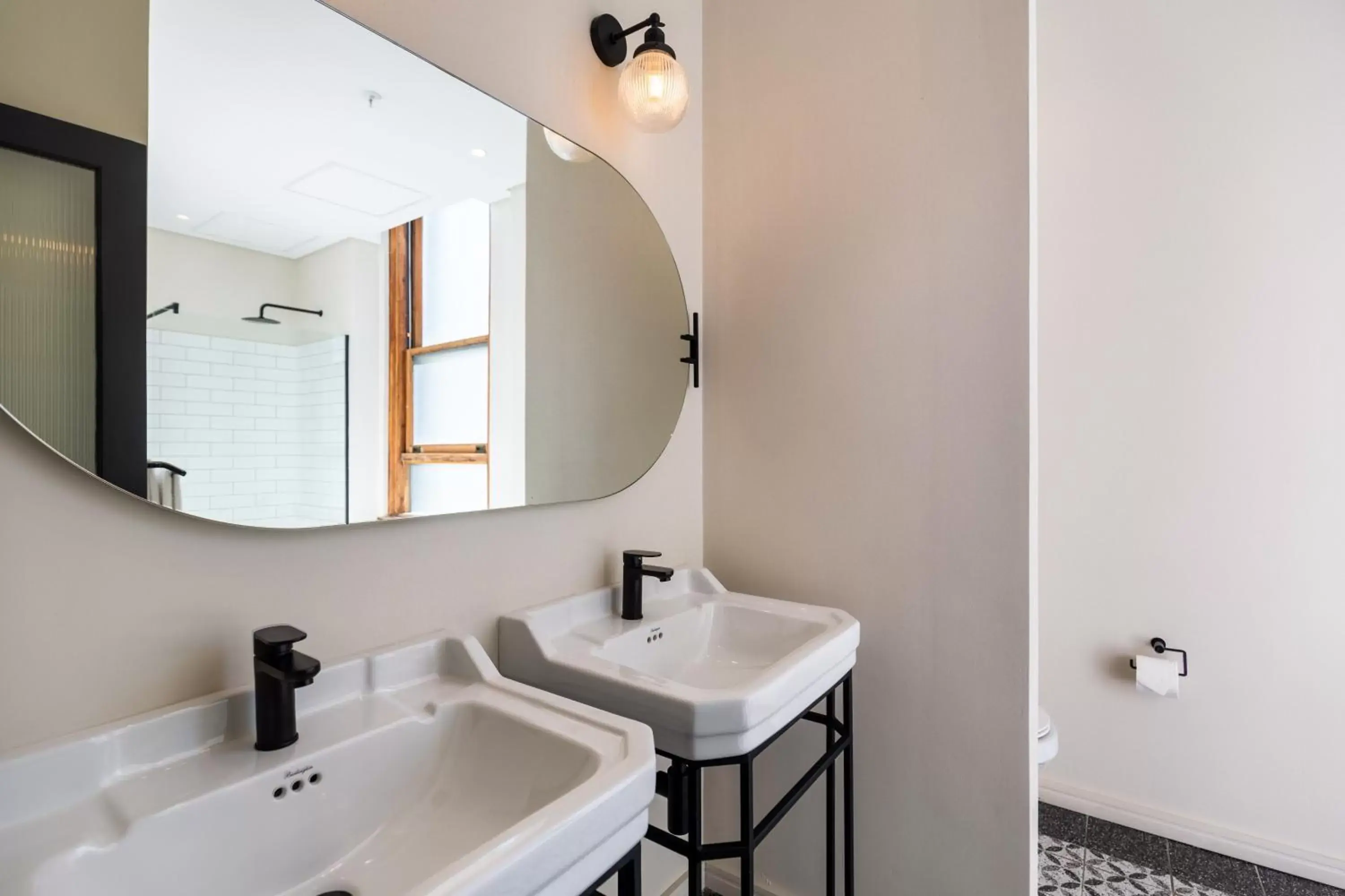 Bathroom in Old Bank Hotel - Lion Roars Hotels & Lodges Bathroom in Old Bank Hotel - Lion Roars Hotels & Lodges