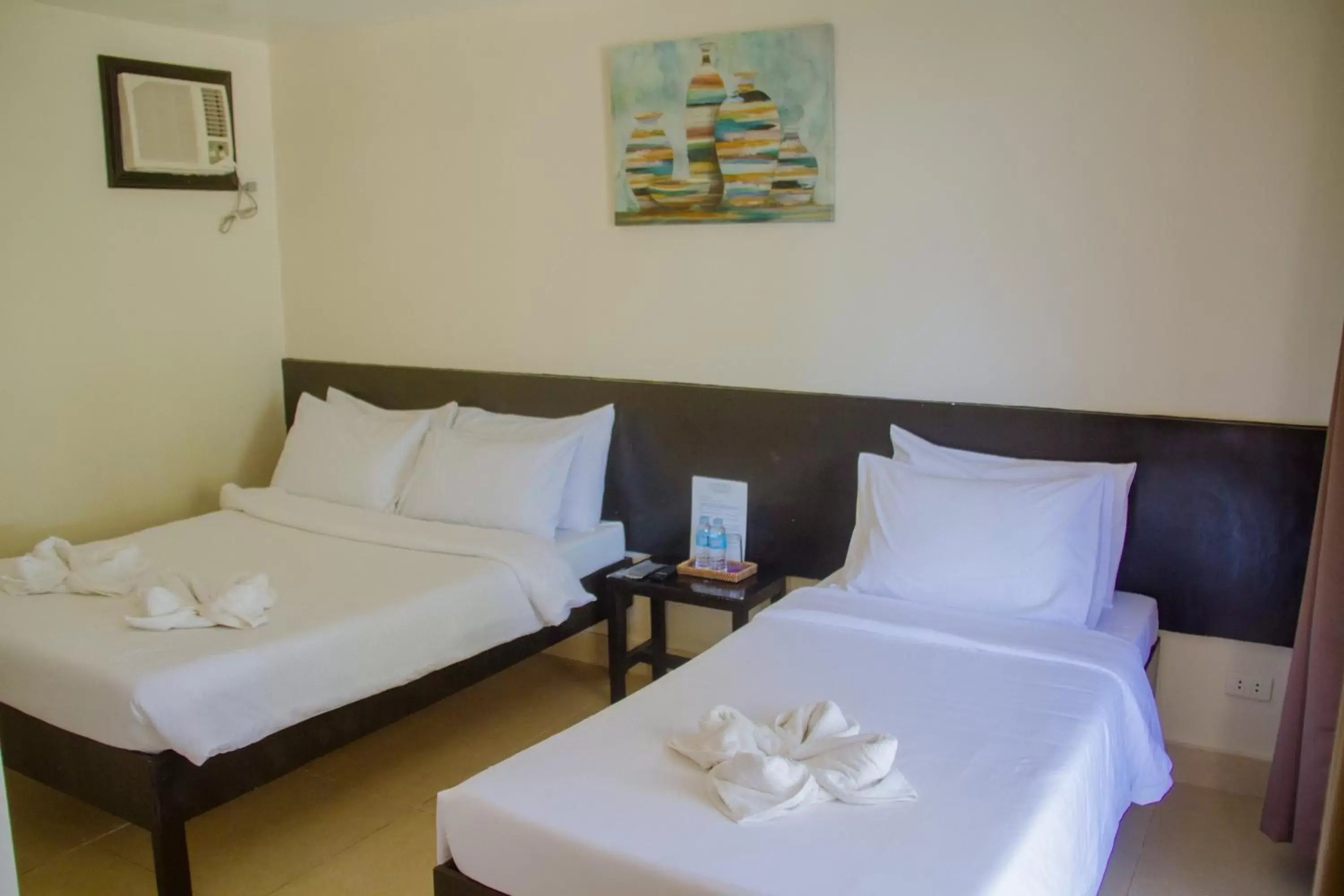 Bed in La Playa Estrella Beach Resort