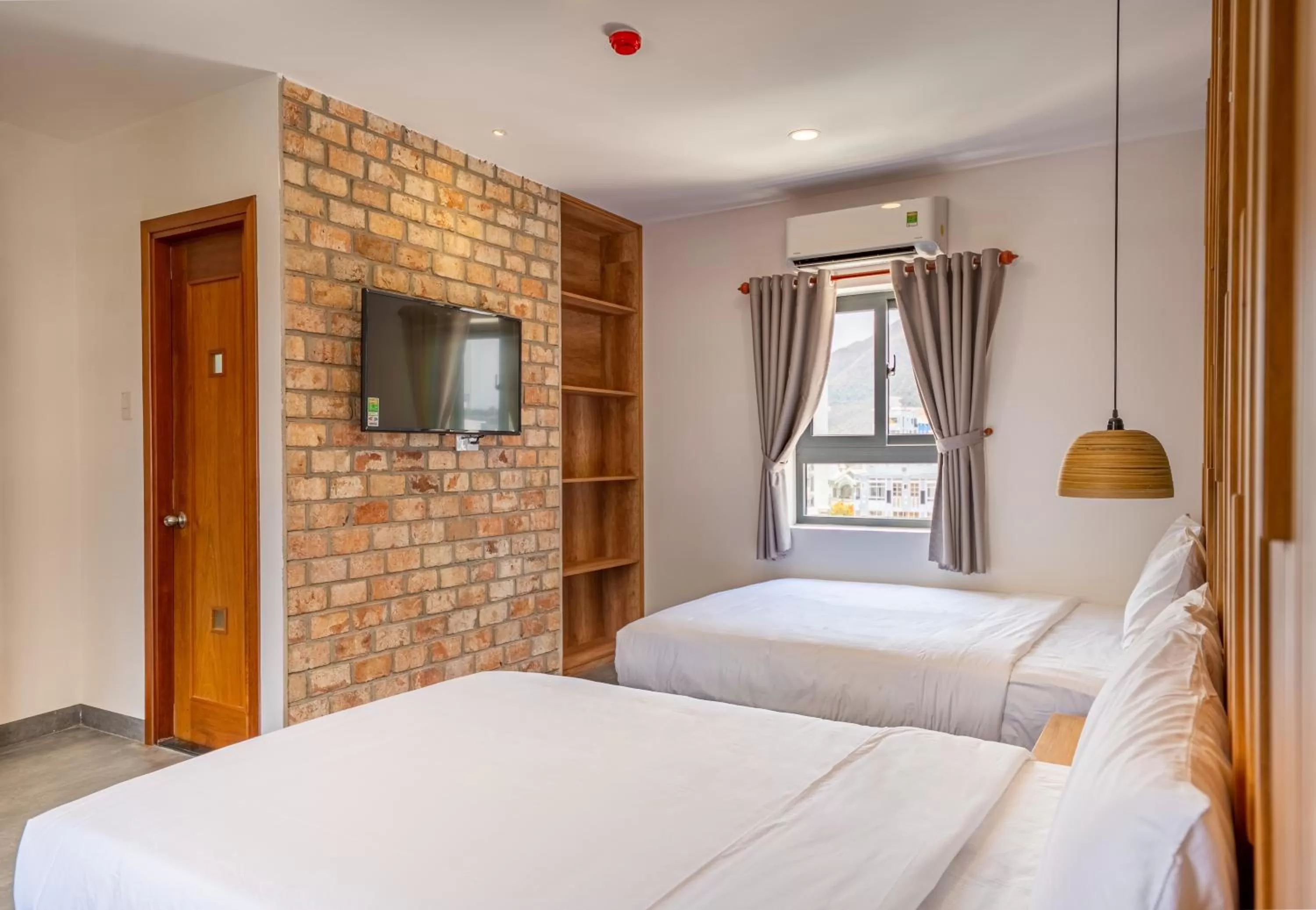 Bed in Coast House Boutique Hotel