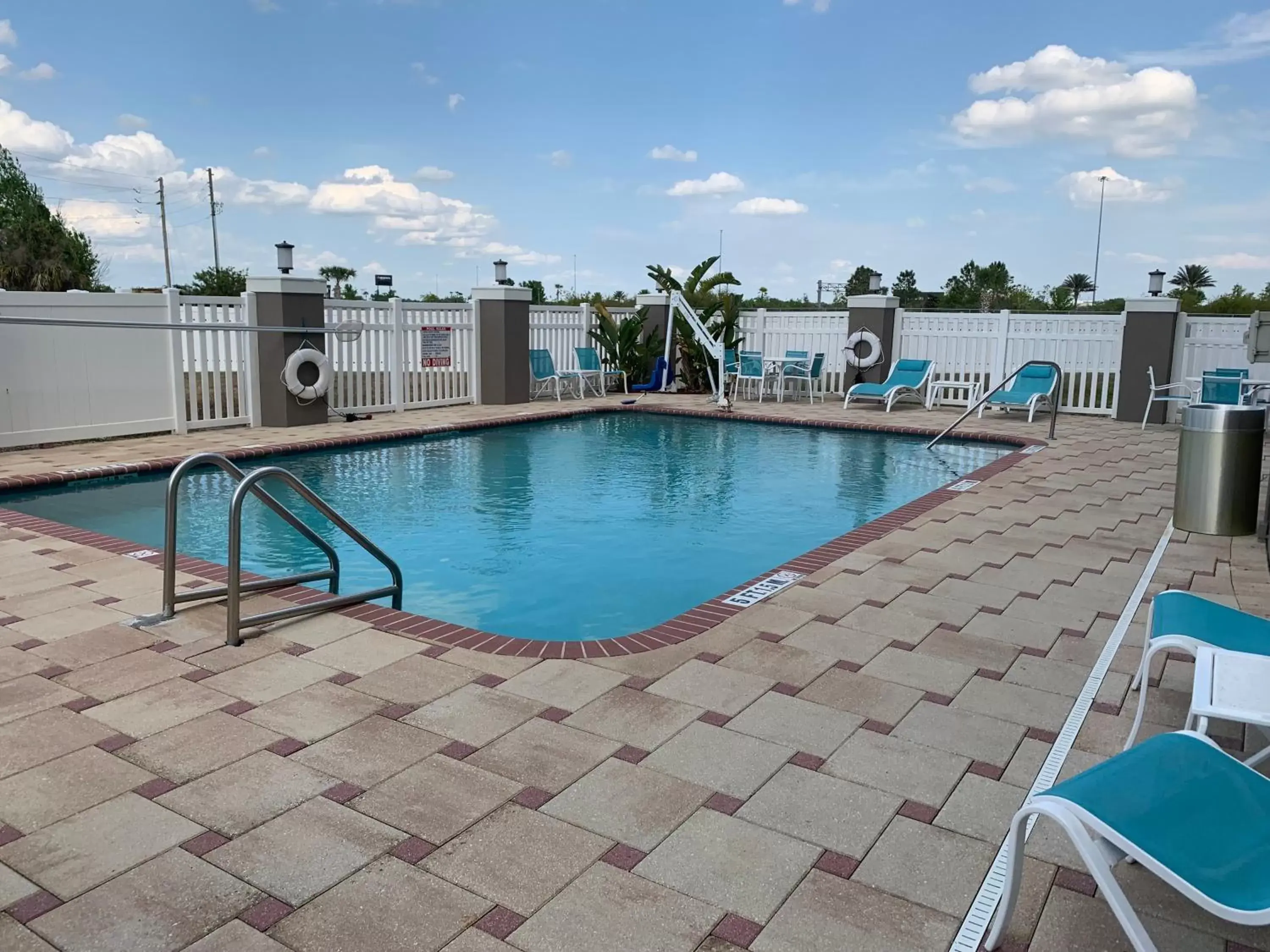 Swimming pool in Holiday Inn Express Orlando - South Davenport, an IHG Hotel