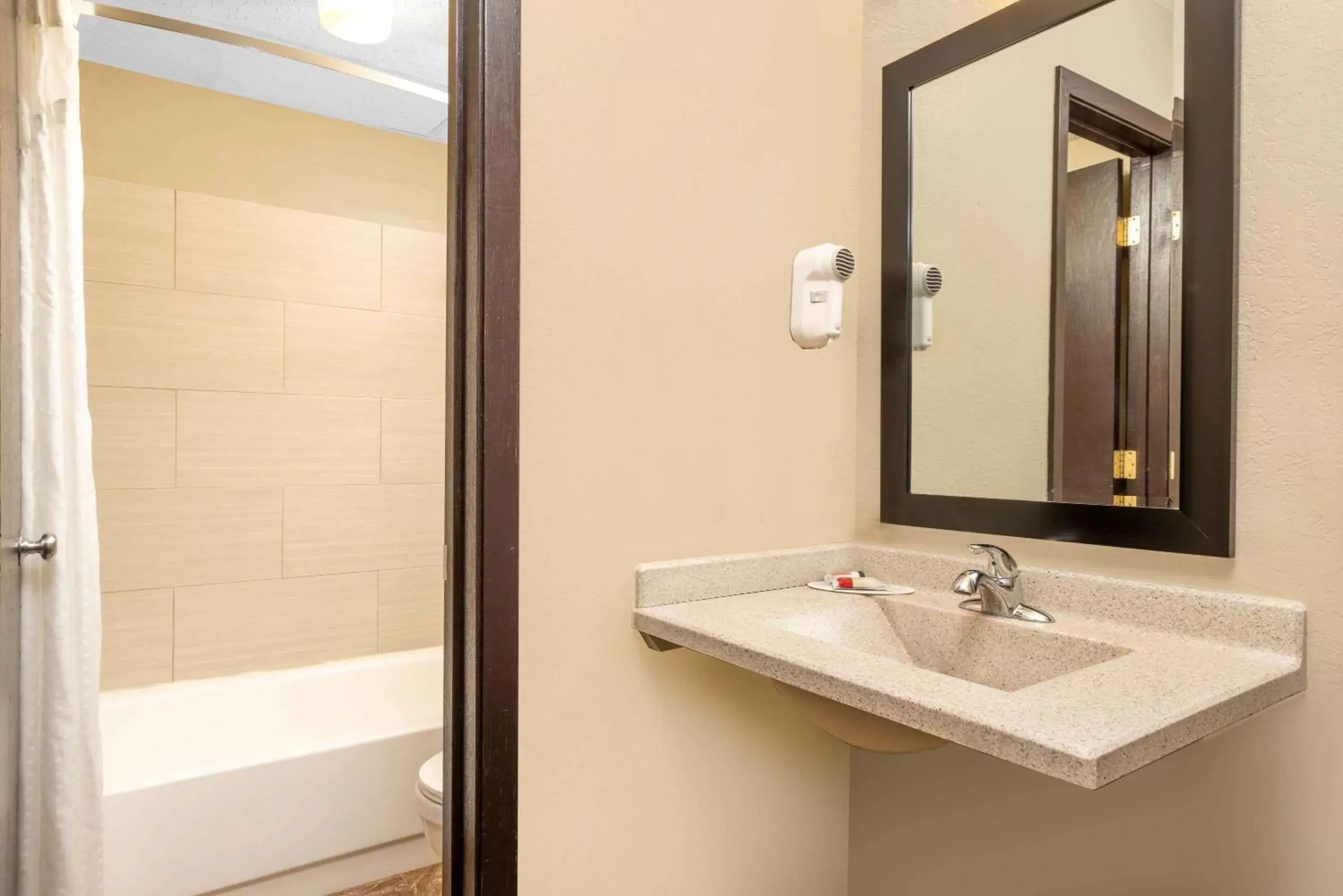 Bathroom in Super 8 by Wyndham Glenwood