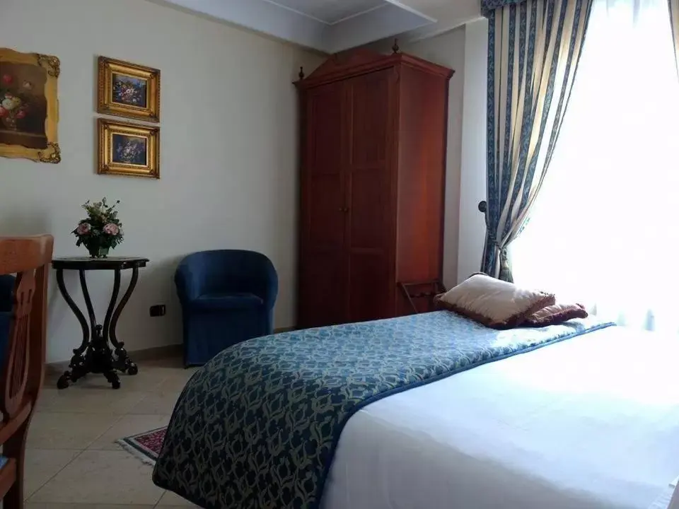 Bed in D'Angelo Palace Hotel