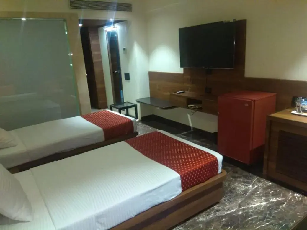 Bed in Quality Inn Regency, Nashik