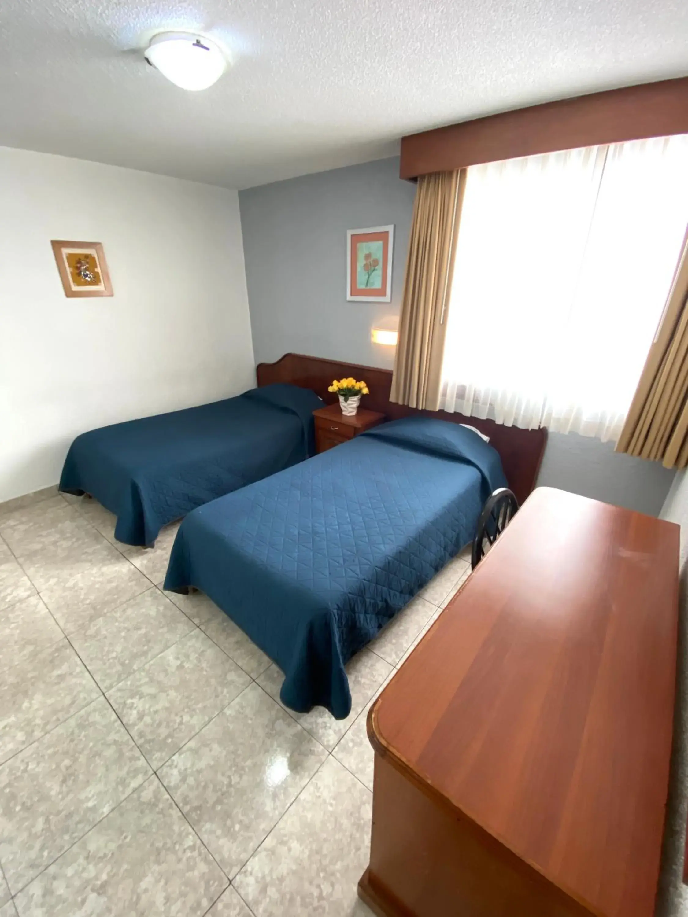 Bed in Hotel Qualitel Plus