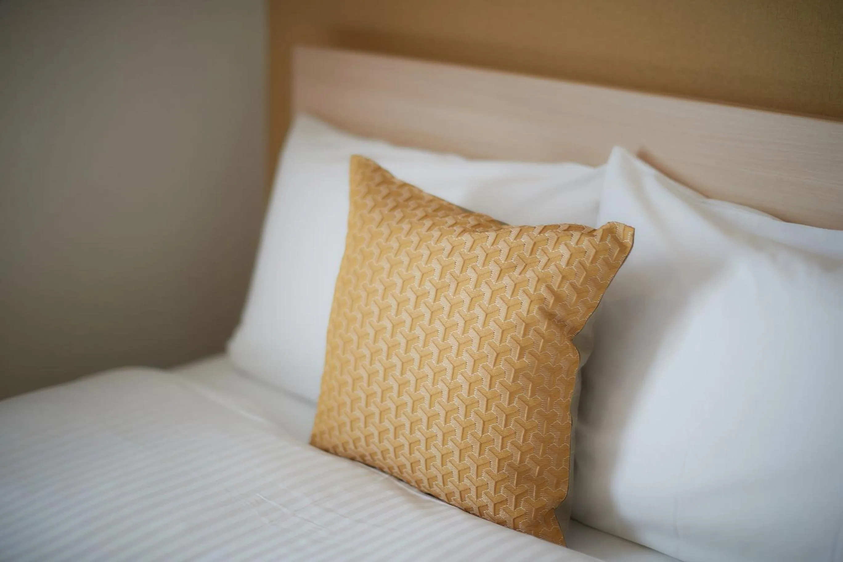 Bed in Y's Inn Naha Oroku Ekimae