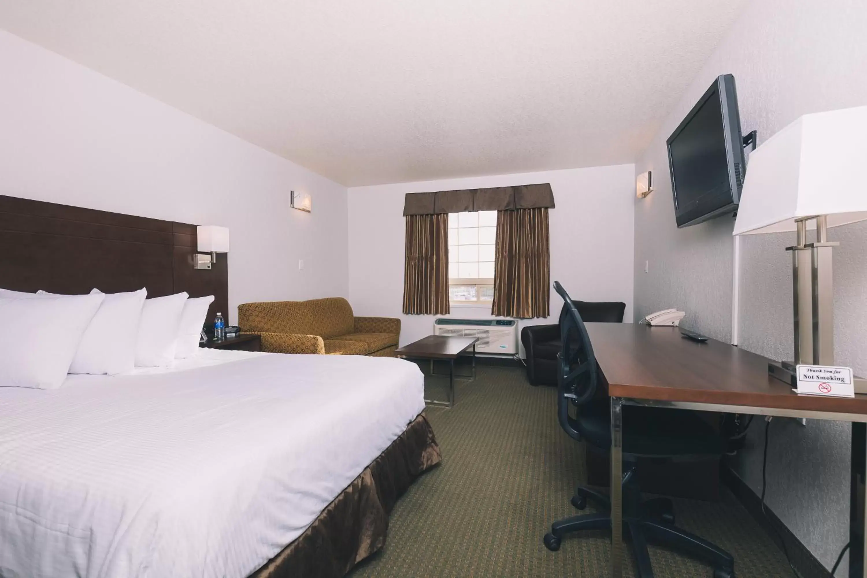 Photo of the whole room in Service Plus Inns and Suites