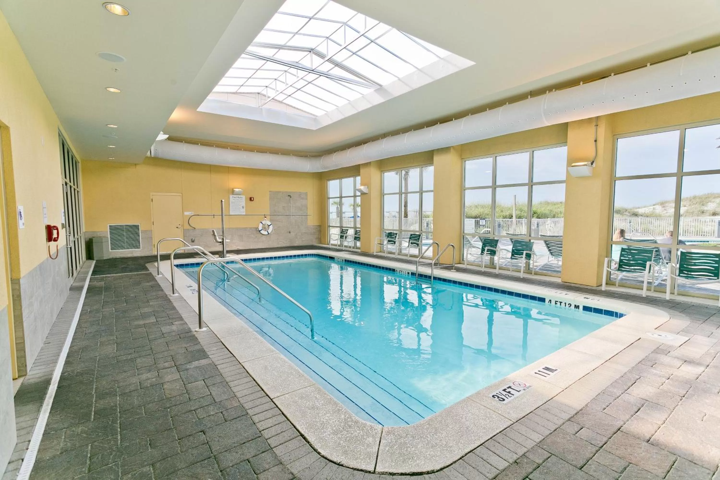 Swimming pool in Holiday Inn Resort Fort Walton Beach by IHG