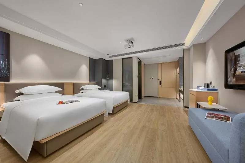 Photo of the whole room, Bed in Fengyue Light Shang Hotel Guangzhou Baiyun Airport Store
