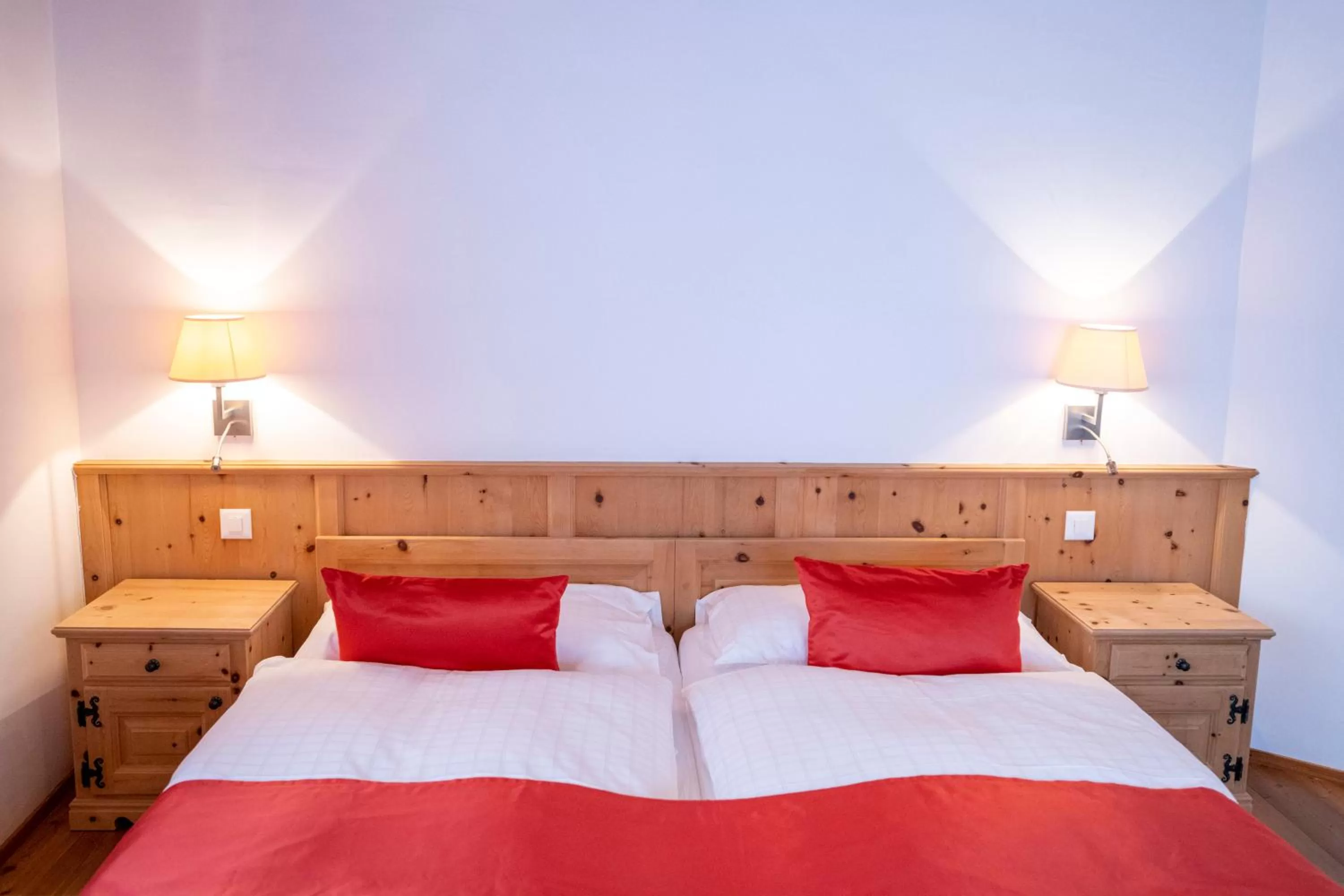 Bed in Hotel Engiadina