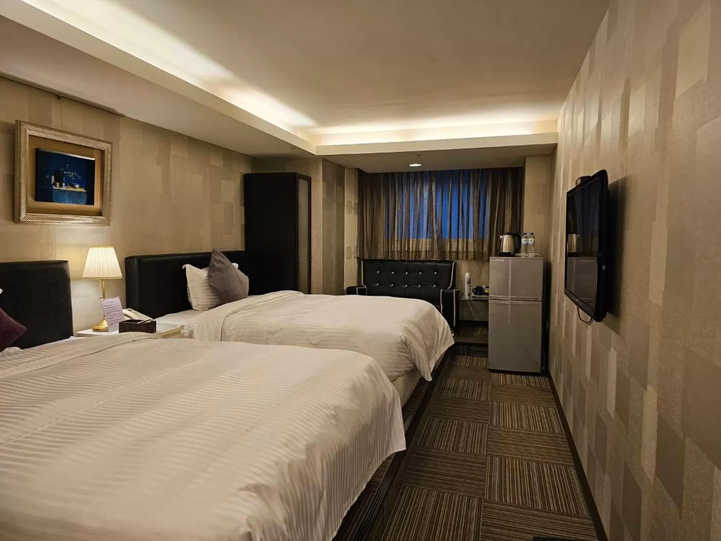 Bed in 意芙旅店 Ifinn Hotel