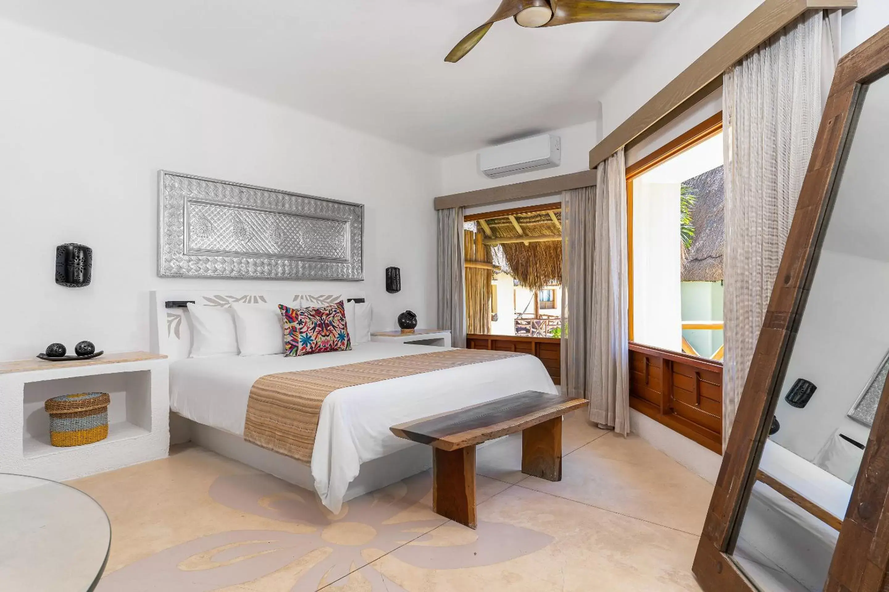 Bed in Mahekal Beach Front Resort & Spa