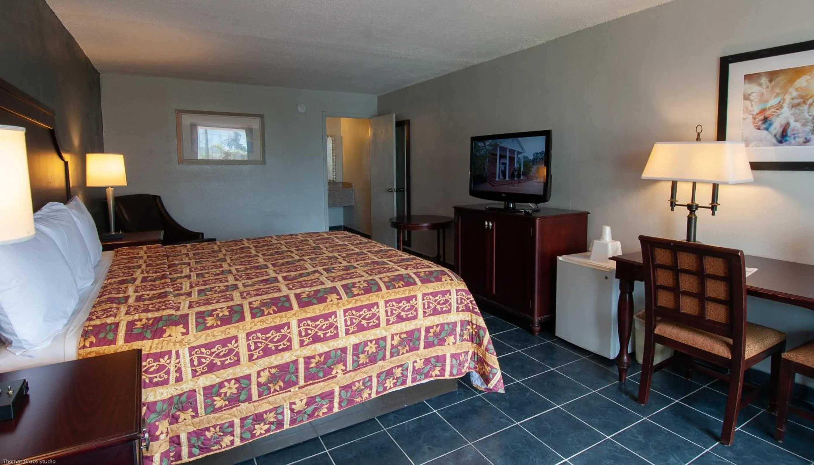 Bed in Express Inn & Suites - 5 Miles from St Petersburg Clearwater Airport