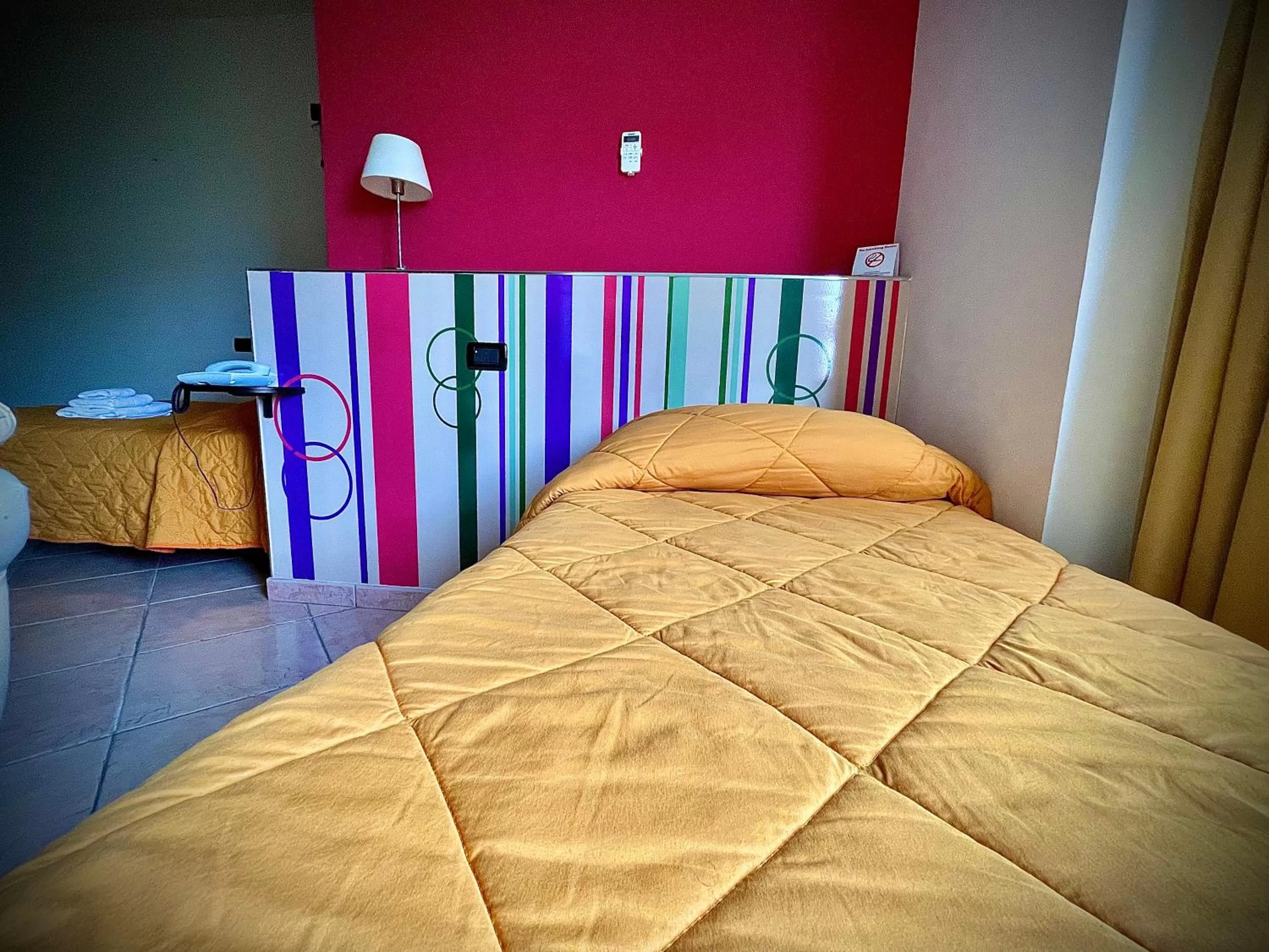 Bed in Hotel Le Ceramiche