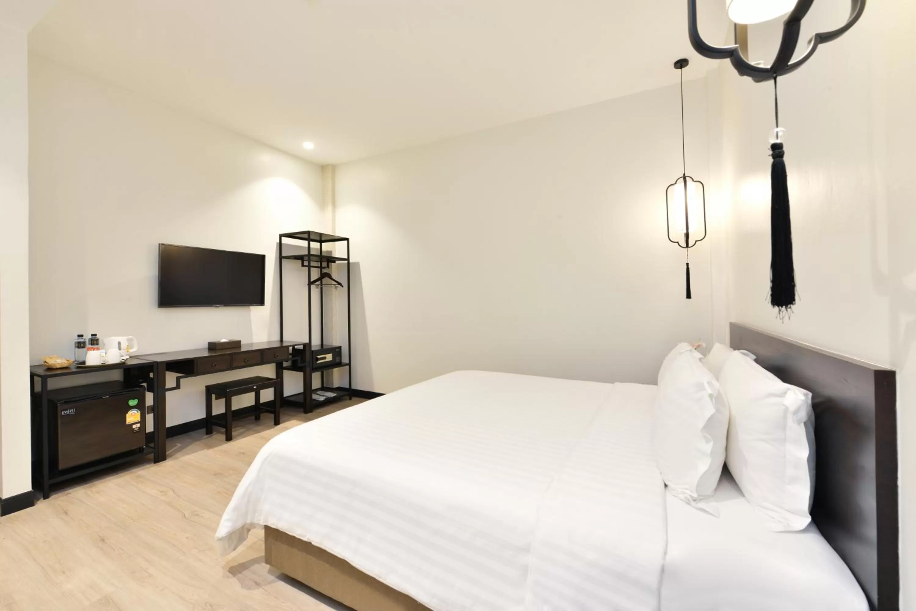 Bed in Oldthaiheng Hotel