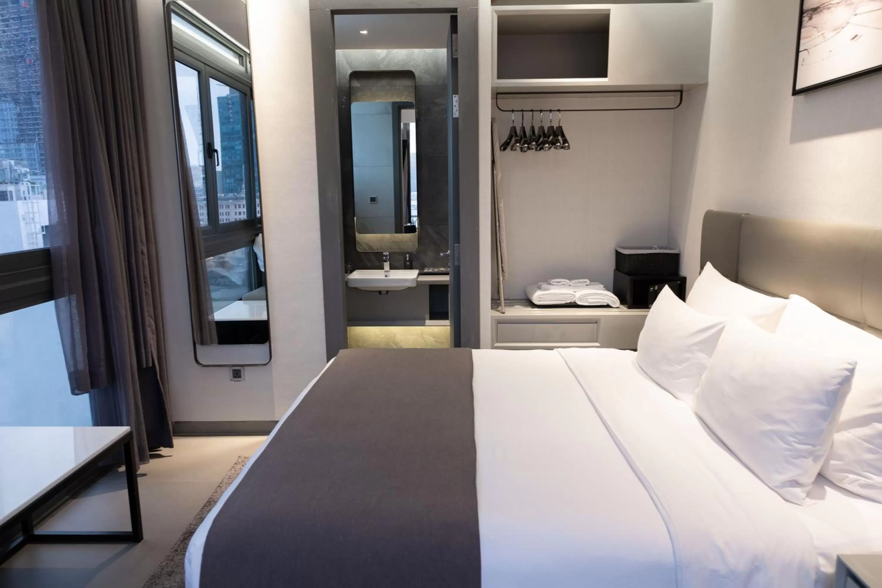 Bed in M Hotel Saigon