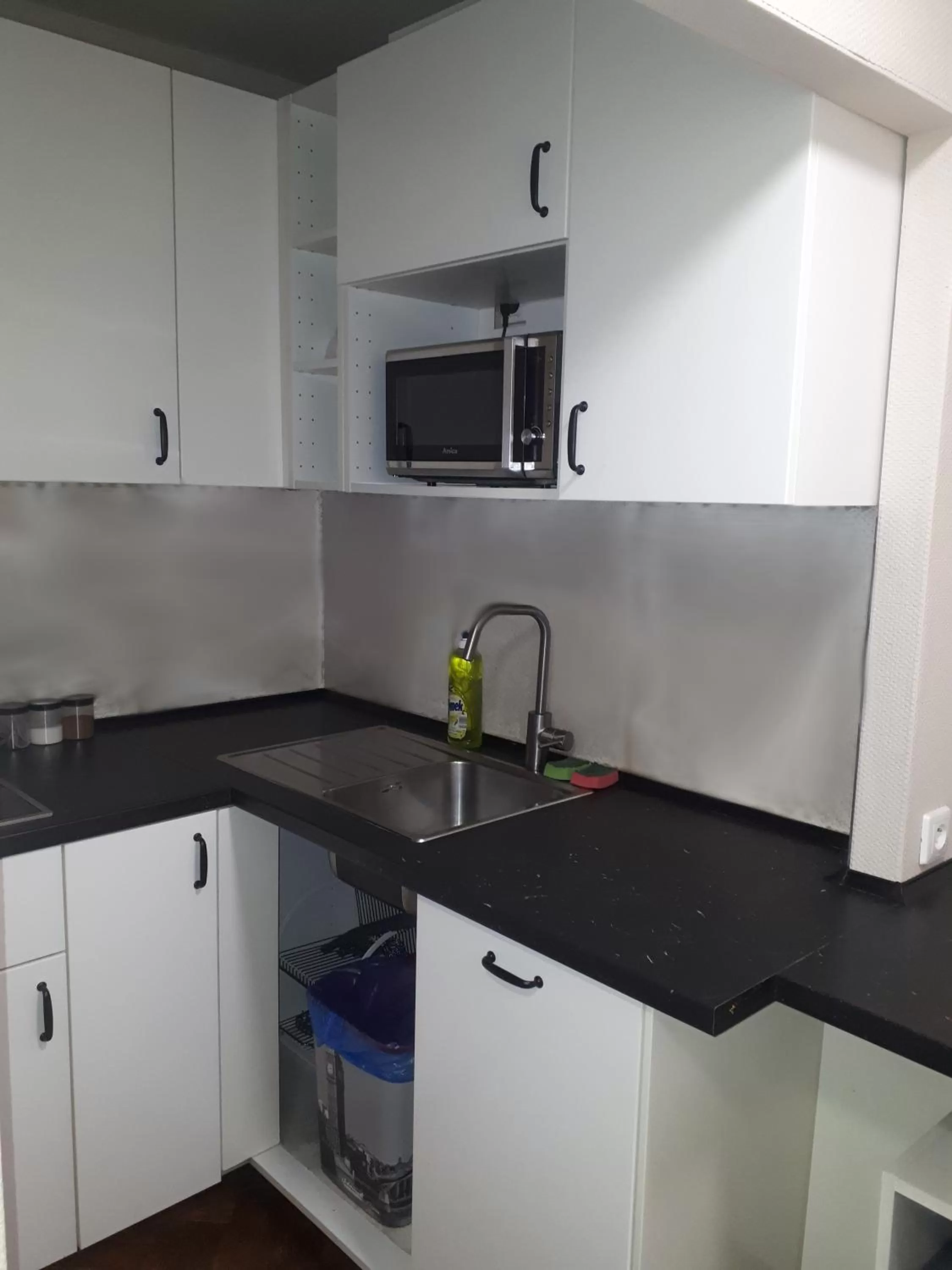 Communal kitchen in Rembrandt Aparthotel