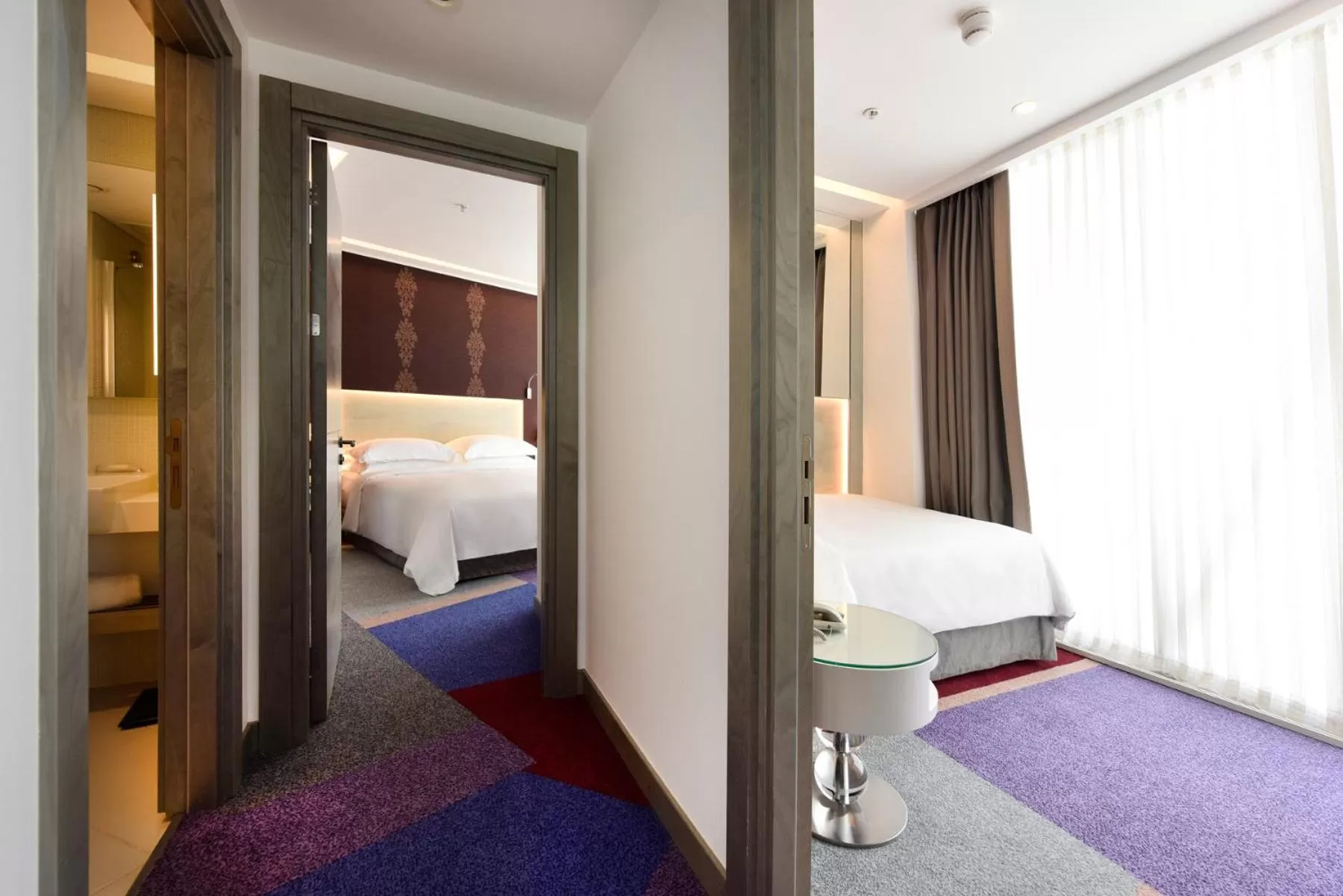 Living room, Bed in Burgu Arjaan by Rotana Istanbul Asia