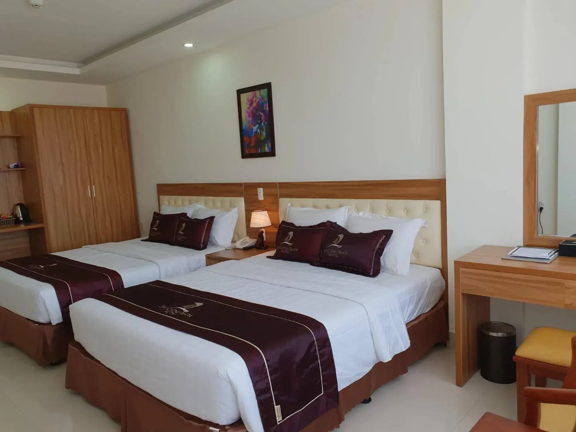 Bed in Phu Cuong Beach Hotel