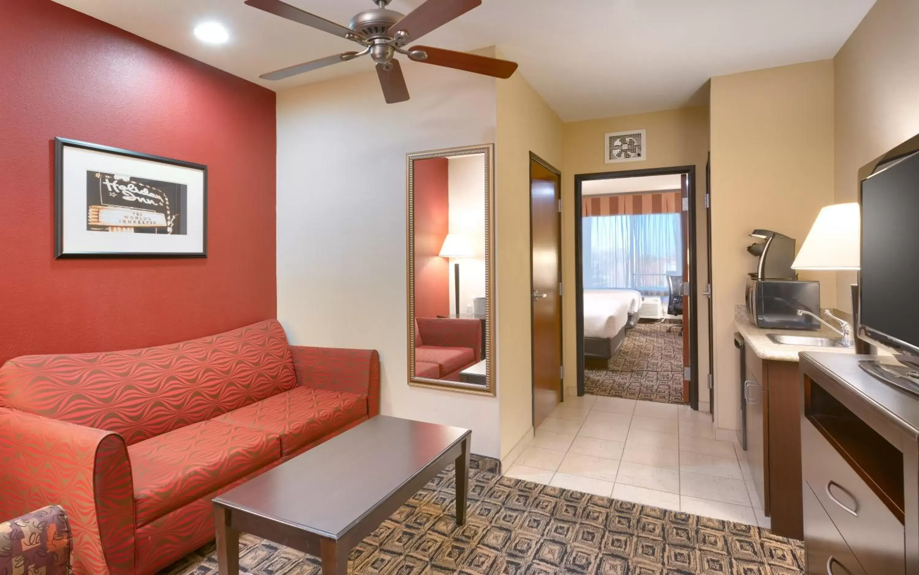 Photo of the whole room, Seating Area in Holiday Inn & Suites Salt Lake City - Airport West, an IHG Hotel