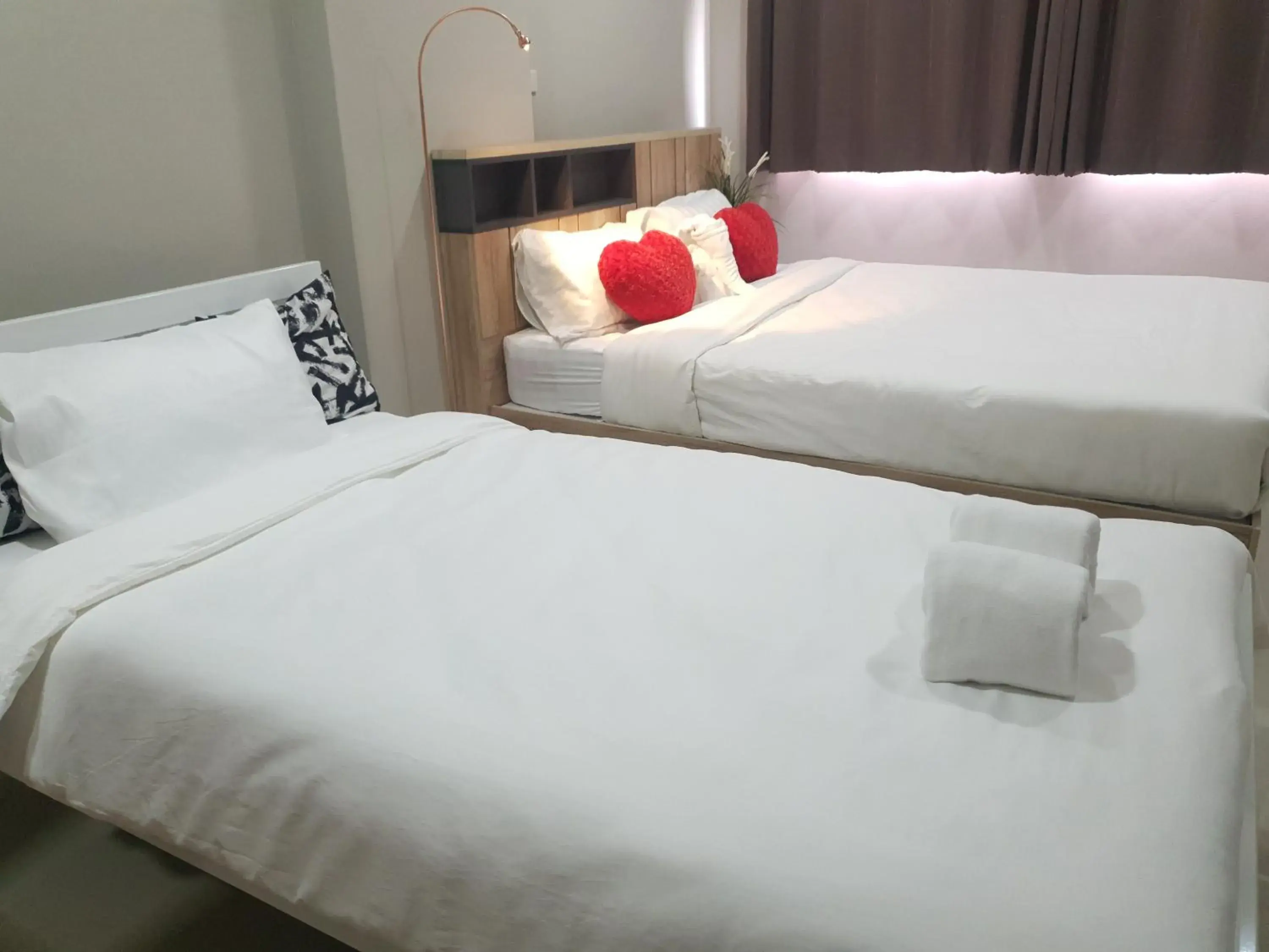 Bed in iResidence Hotel Pathumthani