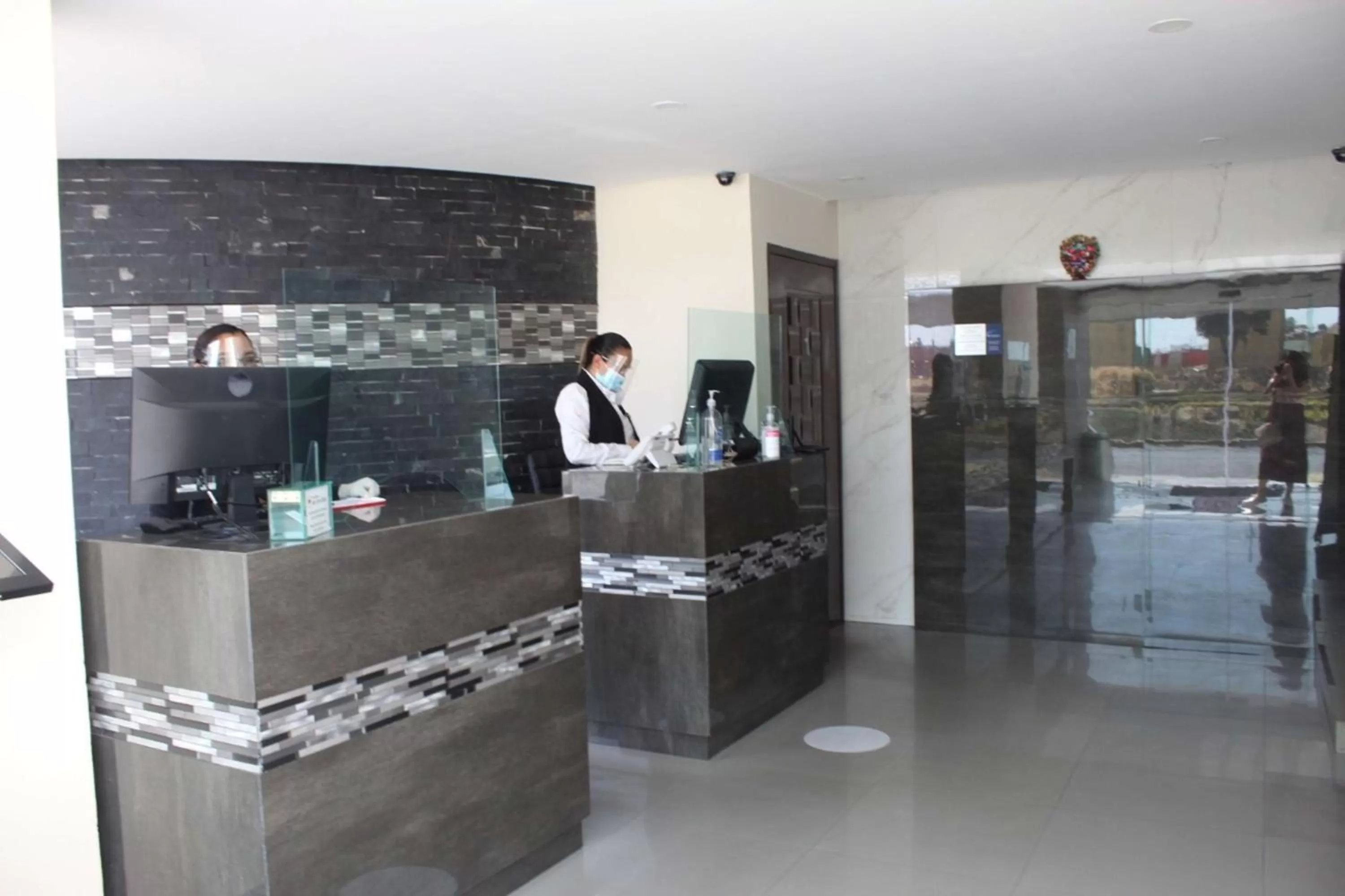 Lobby or reception in Best Western Plus Metepec & Suites