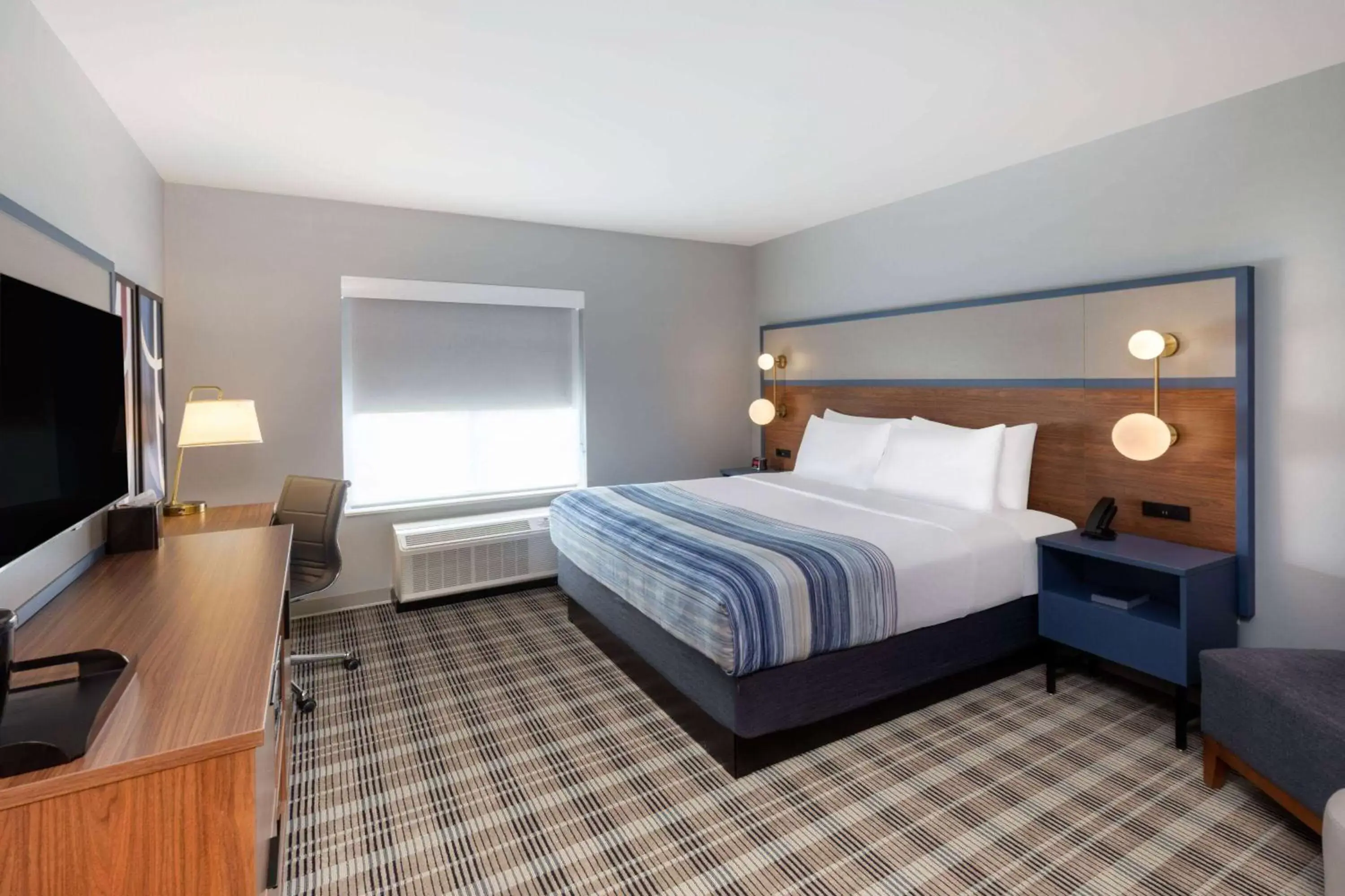 Photo of the whole room, Bed in AmericInn by Wyndham Mountain Home