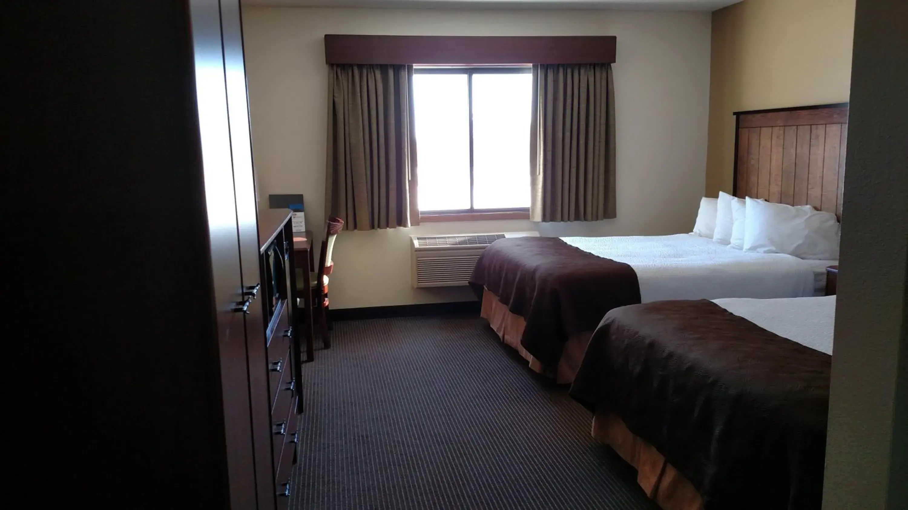 Photo of the whole room, Bed in AmericInn by Wyndham Osage