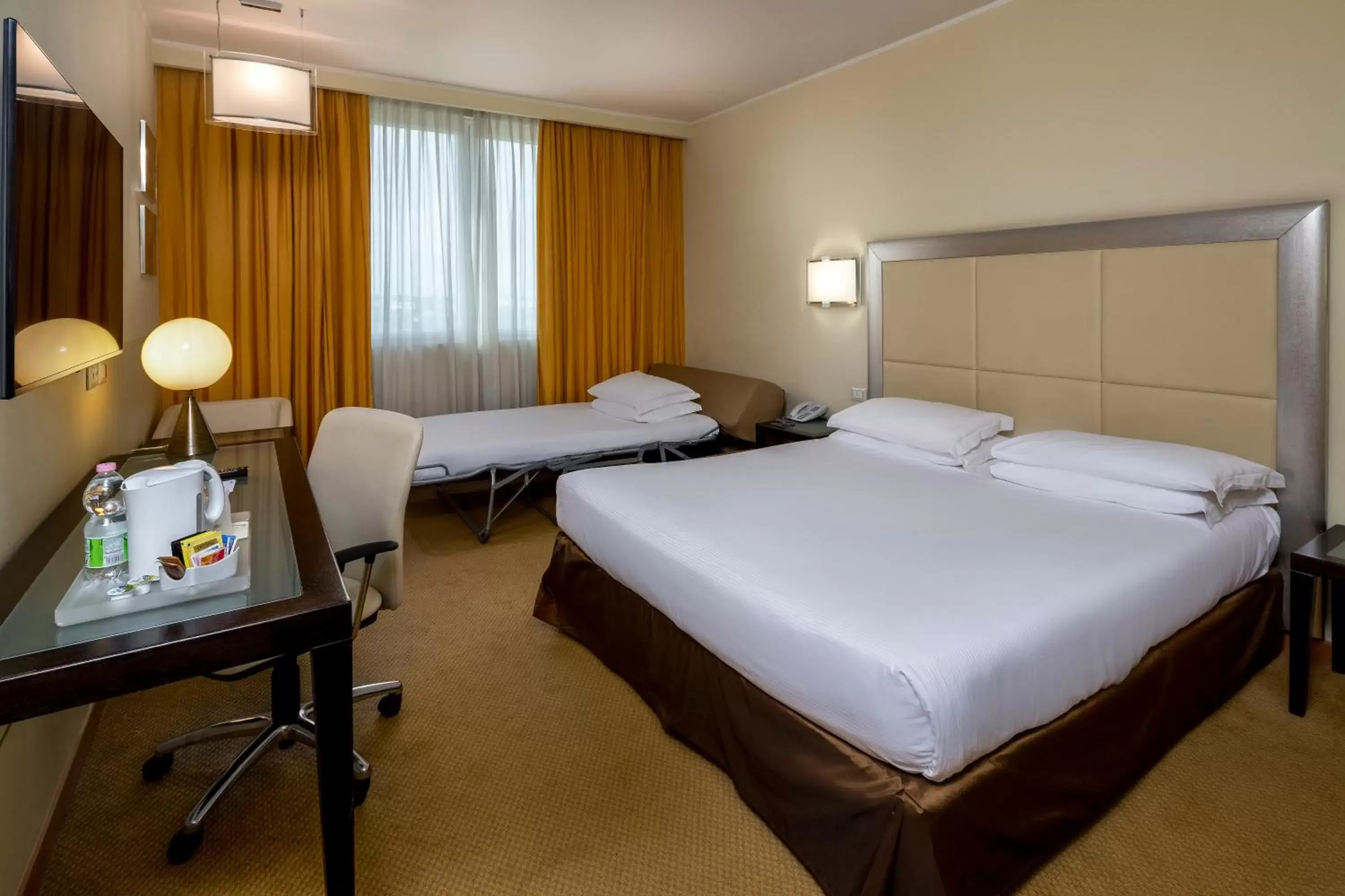 Photo of the whole room, Bed in Crowne Plaza Padova, an IHG Hotel