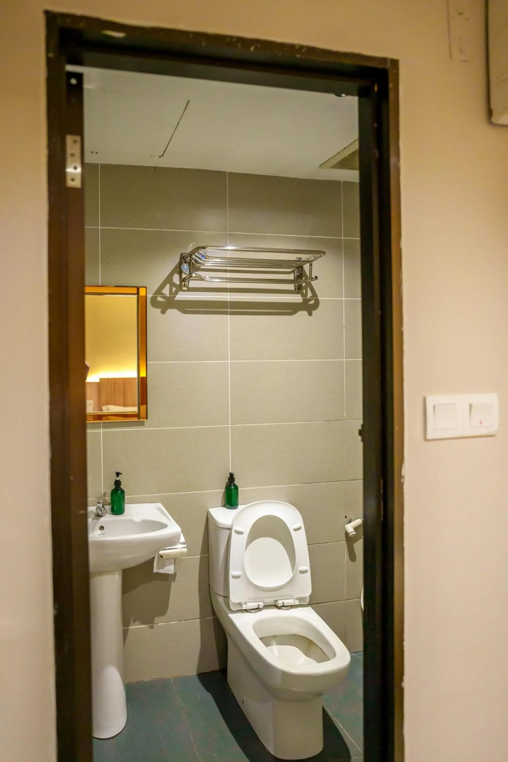 Toilet in Alaxis Hotel