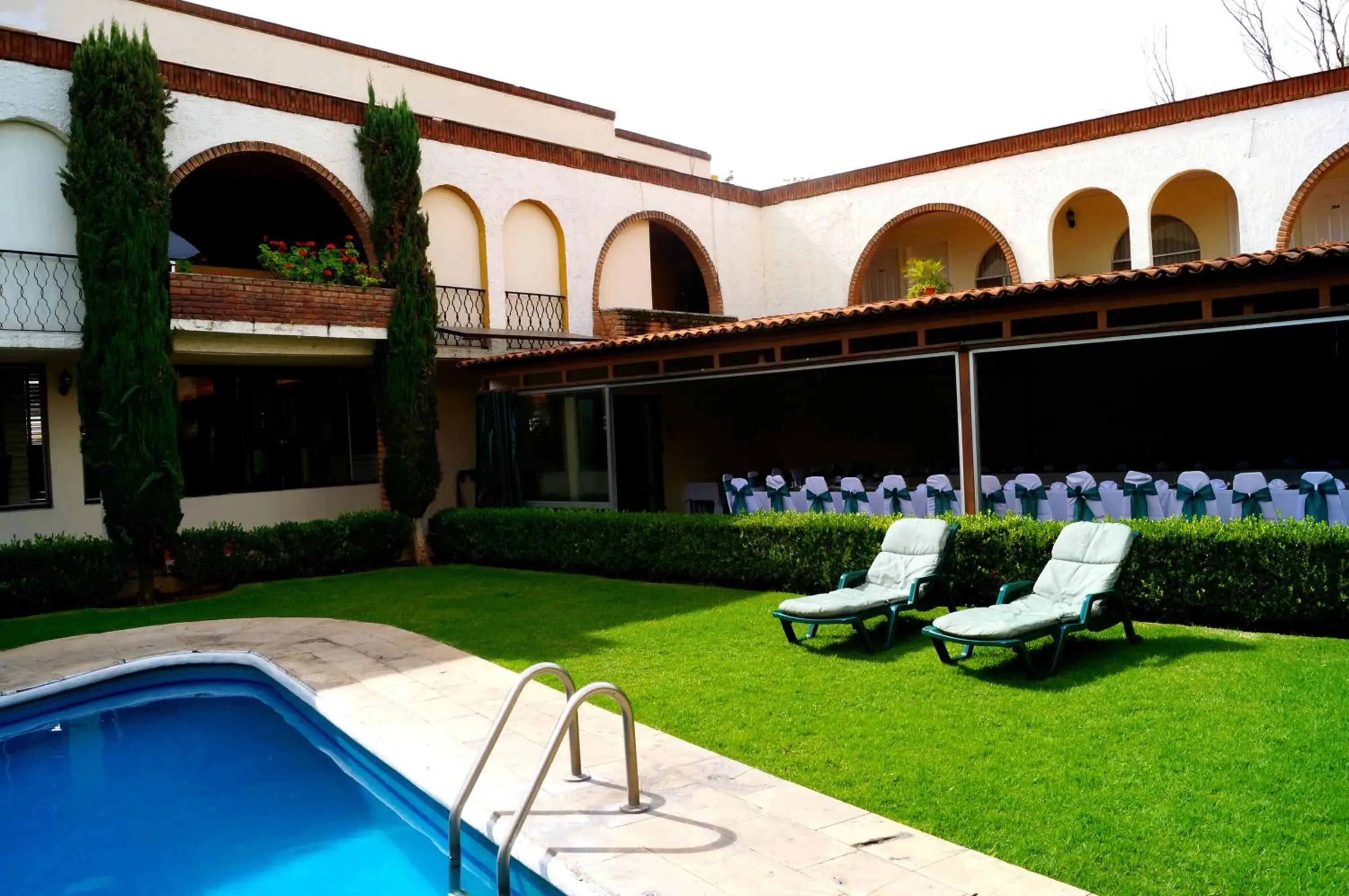 Swimming Pool in Hotel & Suites Villa del Sol