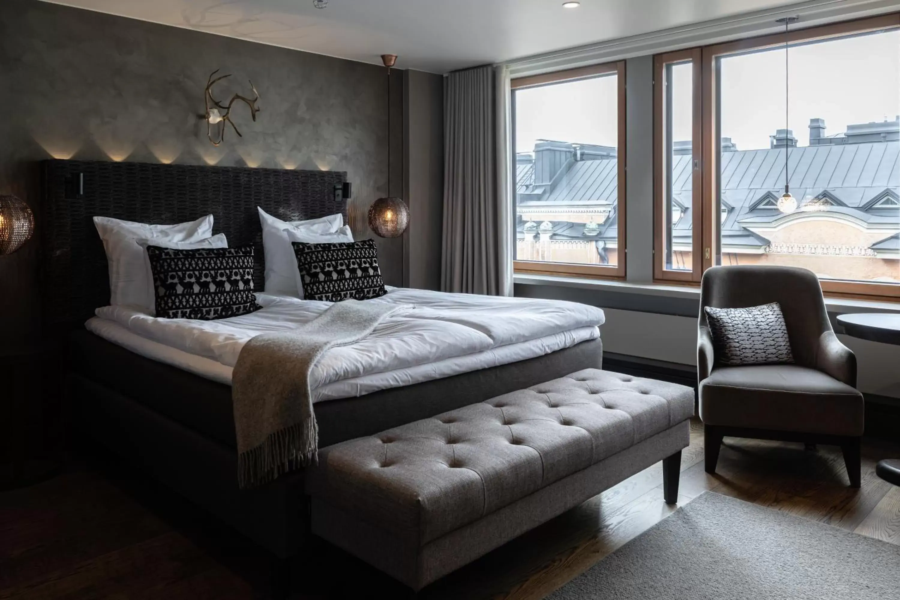 Seating area, Bed in Lapland Hotels Bulevardi