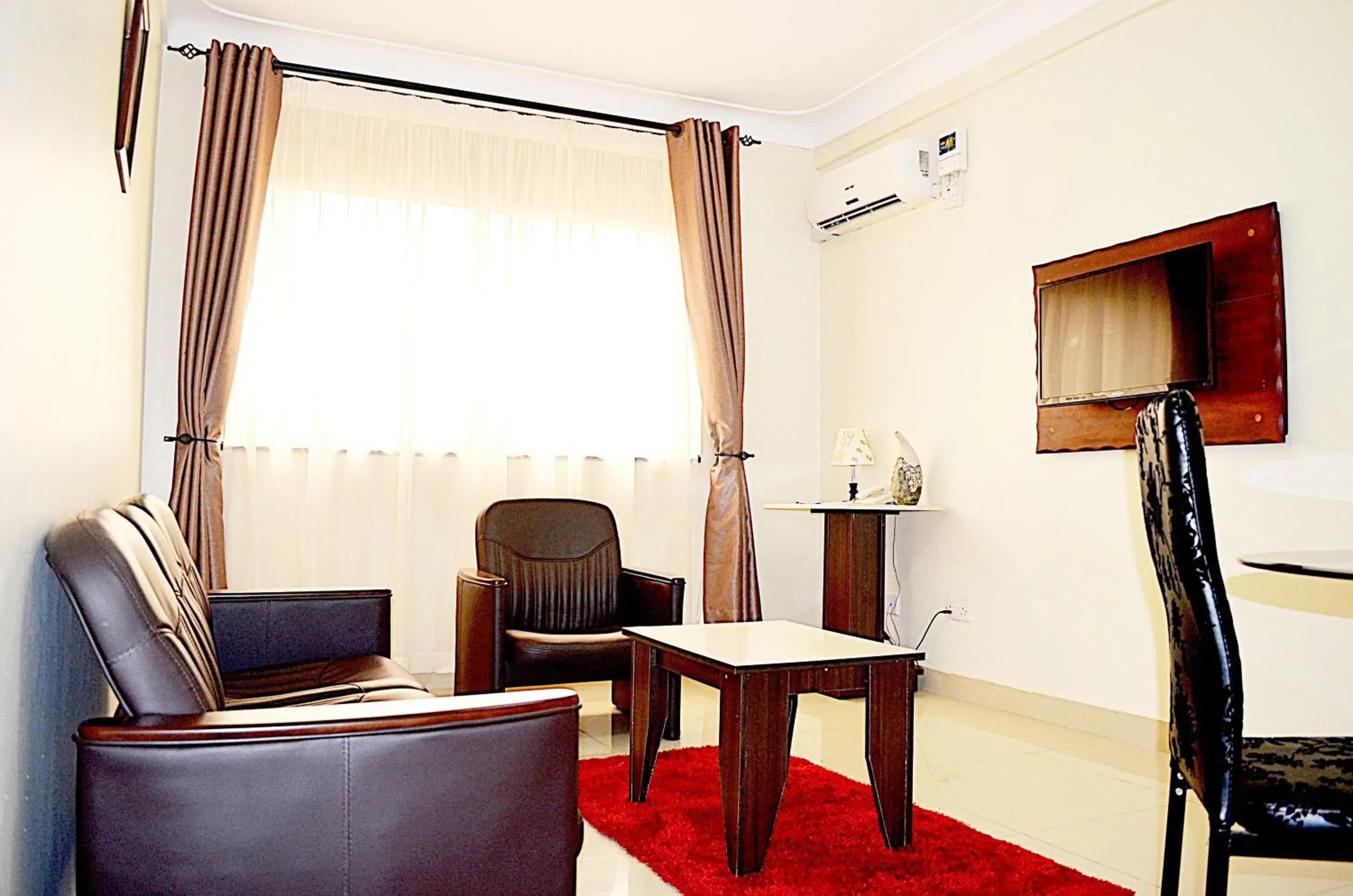 Living room, Seating Area in Marie's Royale Hotel