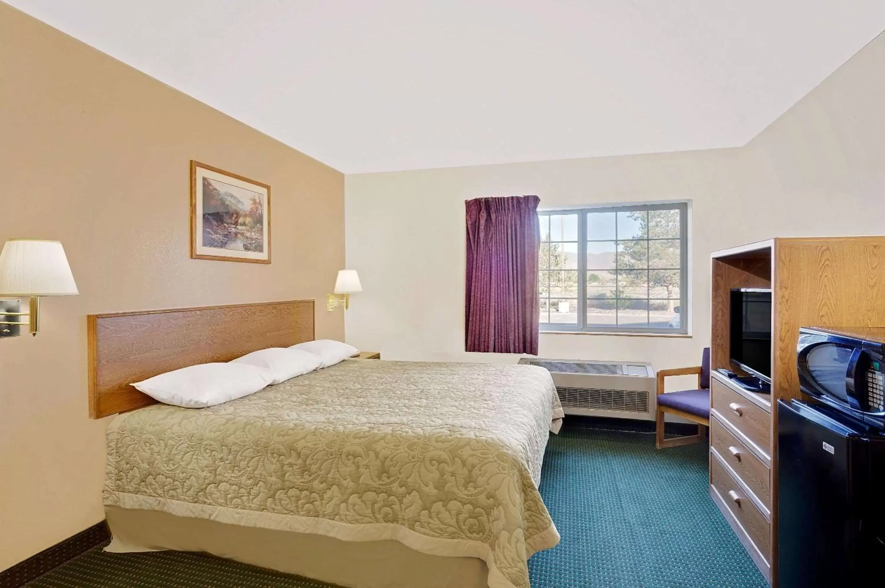 Photo of the whole room in Super 8 by Wyndham Battle Mountain