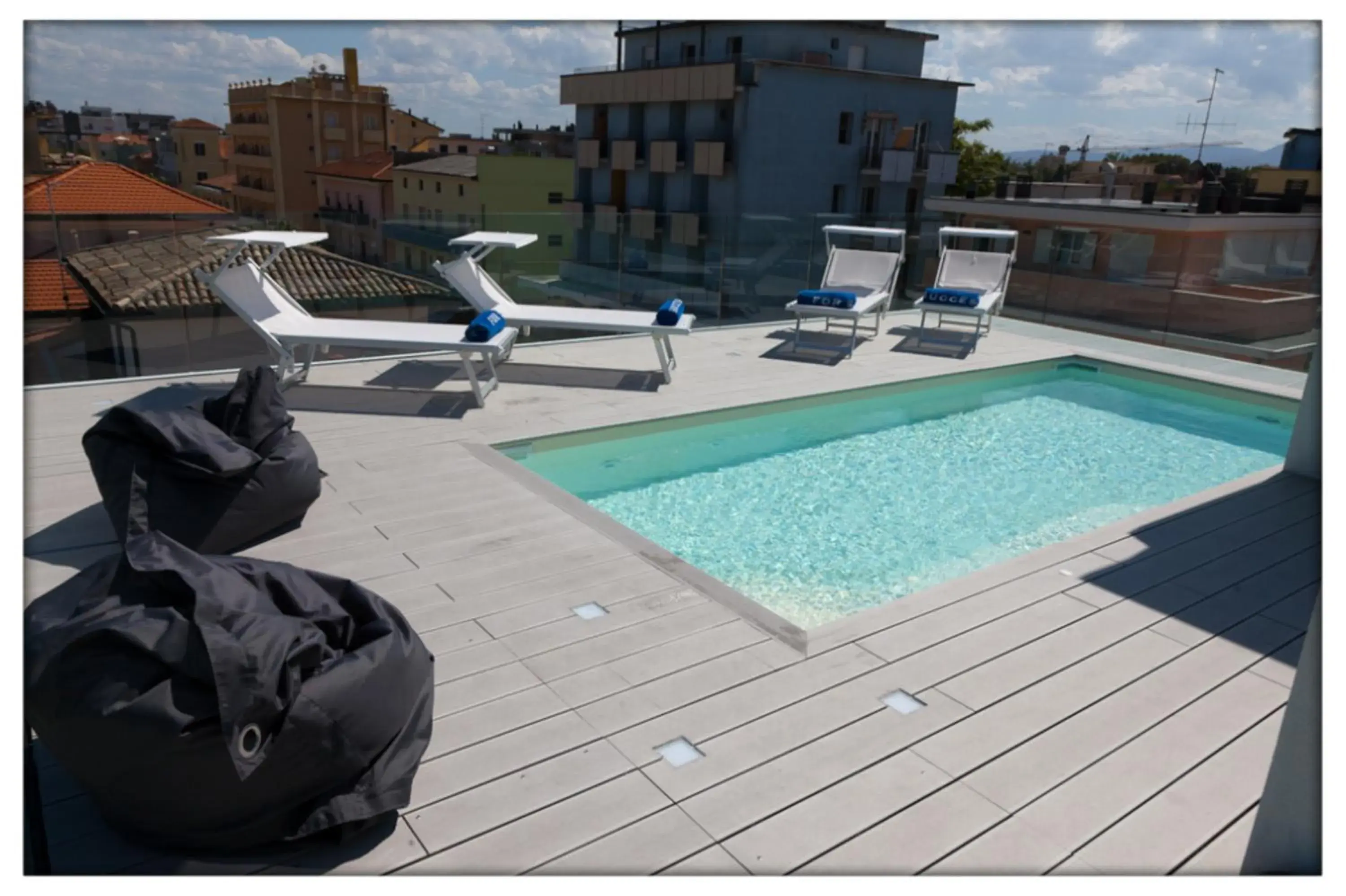 Communal lounge/ TV room, Swimming Pool in Hotel Madalù