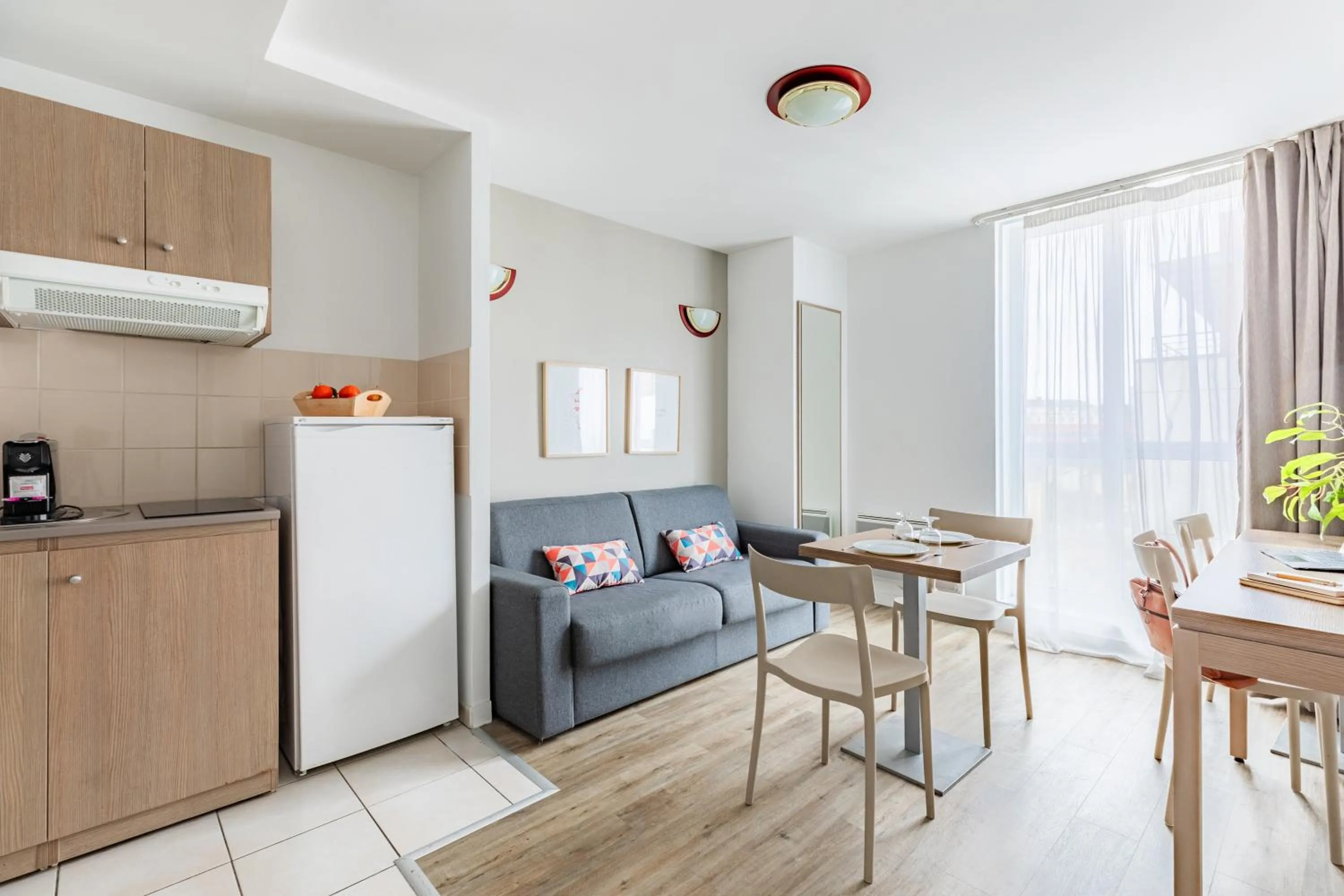 Kitchen or kitchenette in Appart'City Confort Le Mans Centre