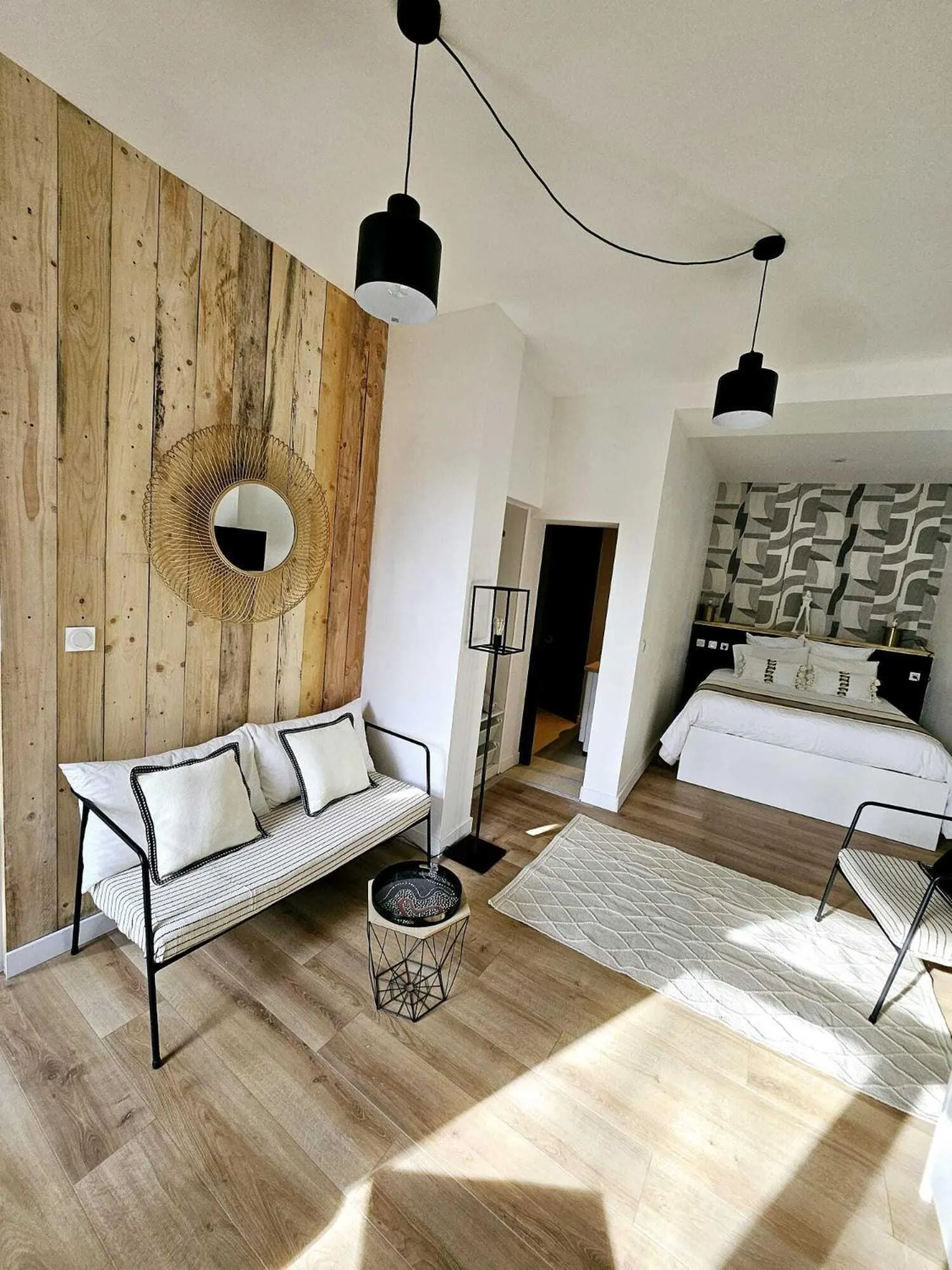 Living room, Bed in La Maison Grivolas Appartements et Maison d'hôtes